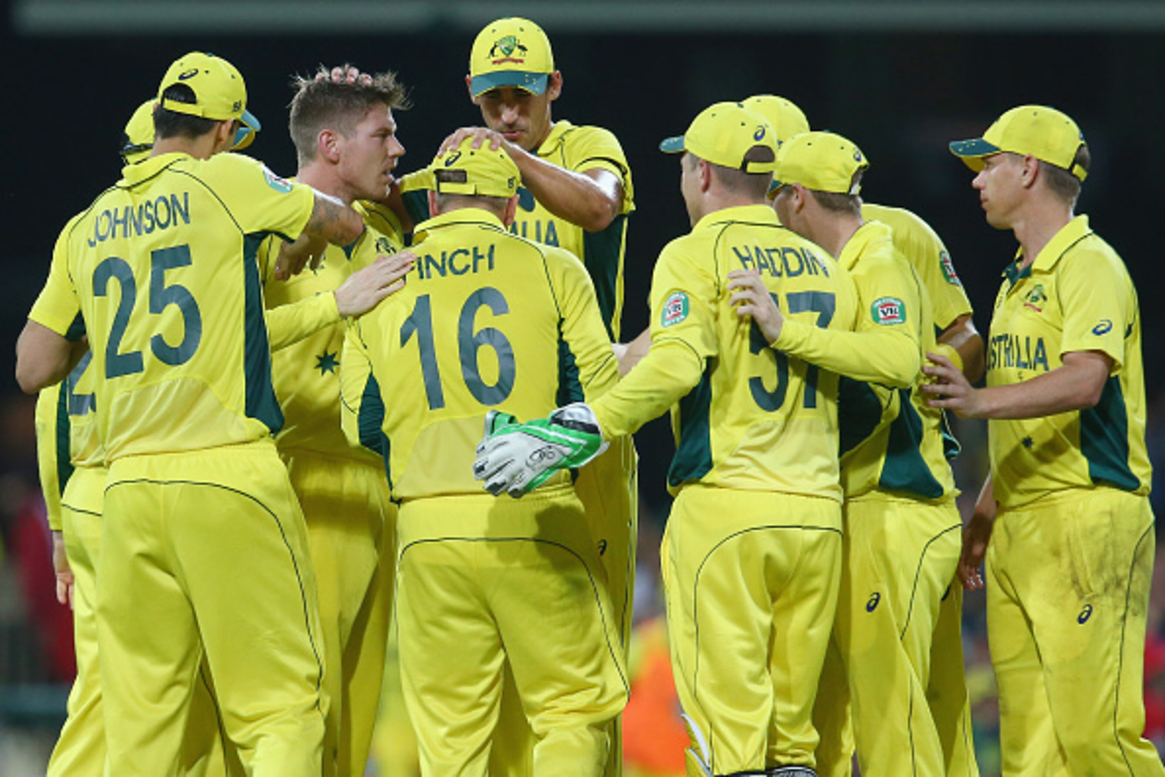 SYDNEY, AUSTRALIA - MARCH 08:  James Faulkner of Australia celebrates with his team mates after taking the wicket of Kumar Sangakkara of Sri Lanka during the 2015 ICC Cricket World Cup match between Australia and Sri Lanka at Sydney Cricket Ground on Marc