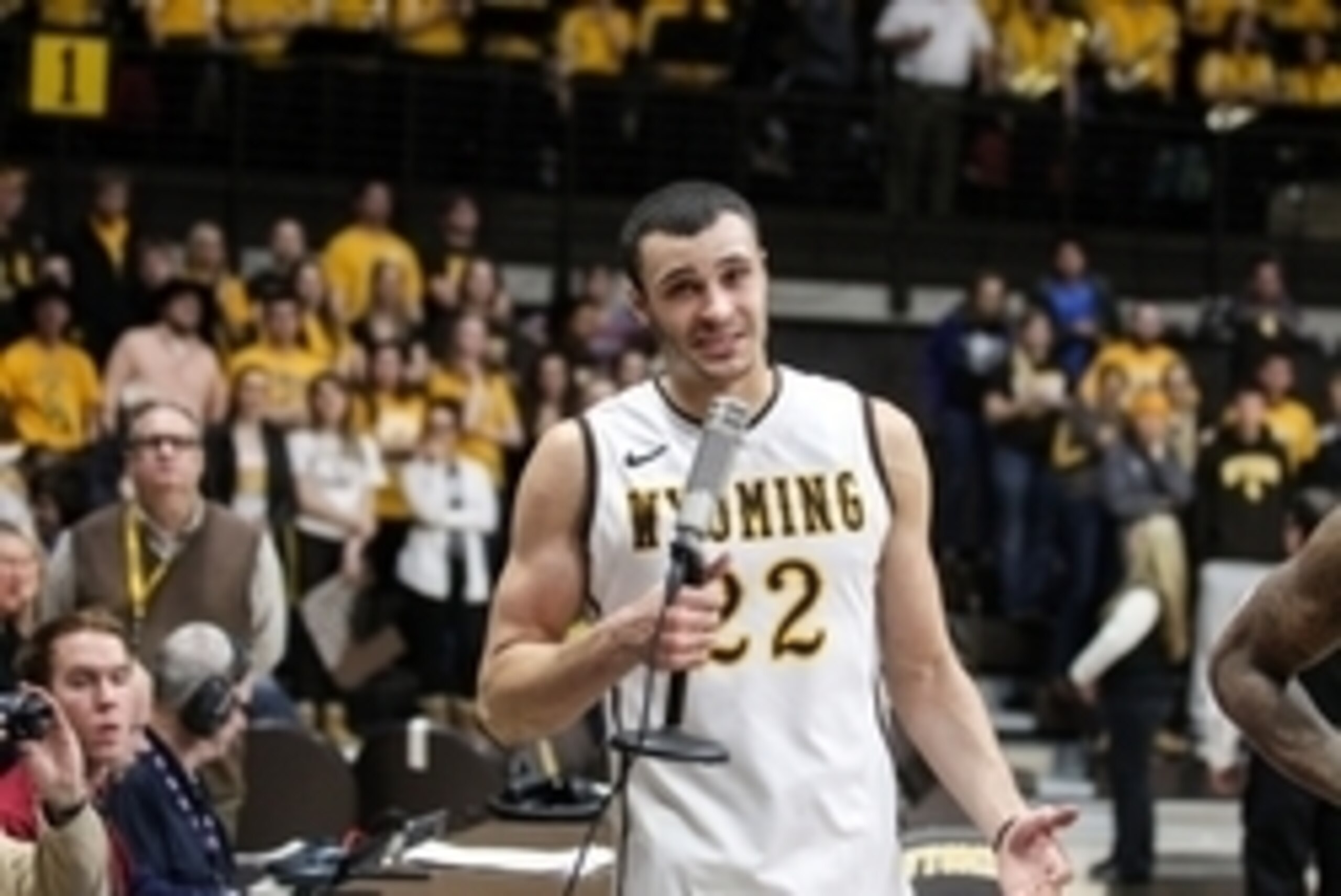 Mar 4, 2015; Laramie, WY, USA; Wyoming Cowboys forward Larry Nance Jr. (22) addresses the crowd after the game against the Utah State Aggies at Arena-Auditorium. The Cowboys defeated the Aggies 76-53. Mandatory Credit: Troy Babbitt-USA TODAY Sports