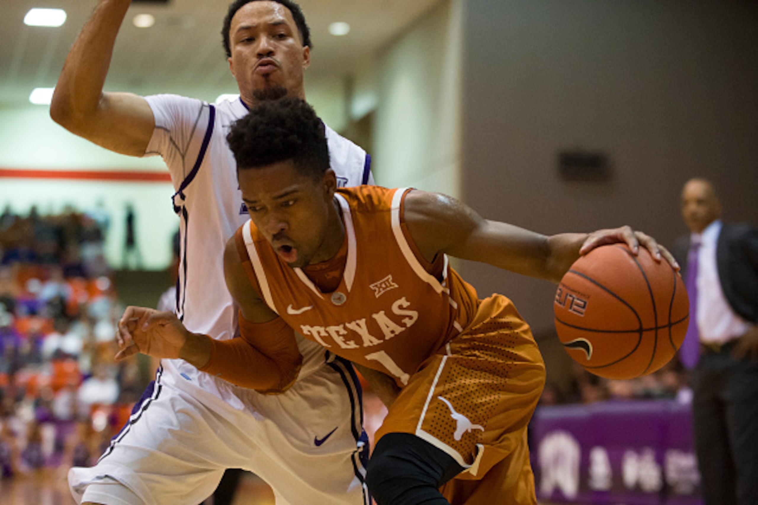 FORT WORTH, TX - JANUARY 19: Isaiah Taylor #1 of the Texas Longhorns drives to the basket against the TCU Horned Frogs on January 19, 2015 at Wilkerson-Greines AC in Fort Worth, Texas.  (Photo by Cooper Neill/Getty Images)