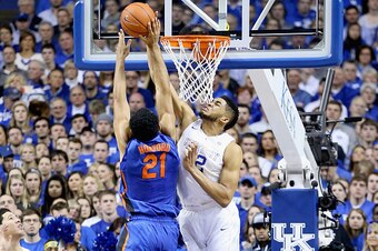 LEXINGTON, KY - MARCH 07:  Karl-Anthony Towns #12 of the Kentucky Wildcats defends the shot of Jon Horford #21 of the Florida Gators during the game at Rupp Arena on March 7, 2015 in Lexington, Kentucky.  (Photo by Andy Lyons/Getty Images)