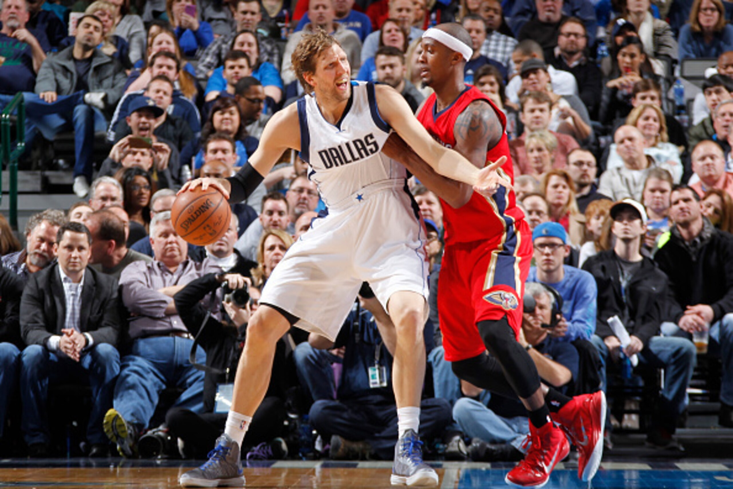 DALLAS, TX - MARCH 2: Dirk Nowitzki #41 of the Dallas Mavericks handles the ball against Dante Cunningham #44 of the New Orleans Pelicans on March 2, 2015 at the American Airlines Center in Dallas, Texas. NOTE TO USER: User expressly acknowledges and agre