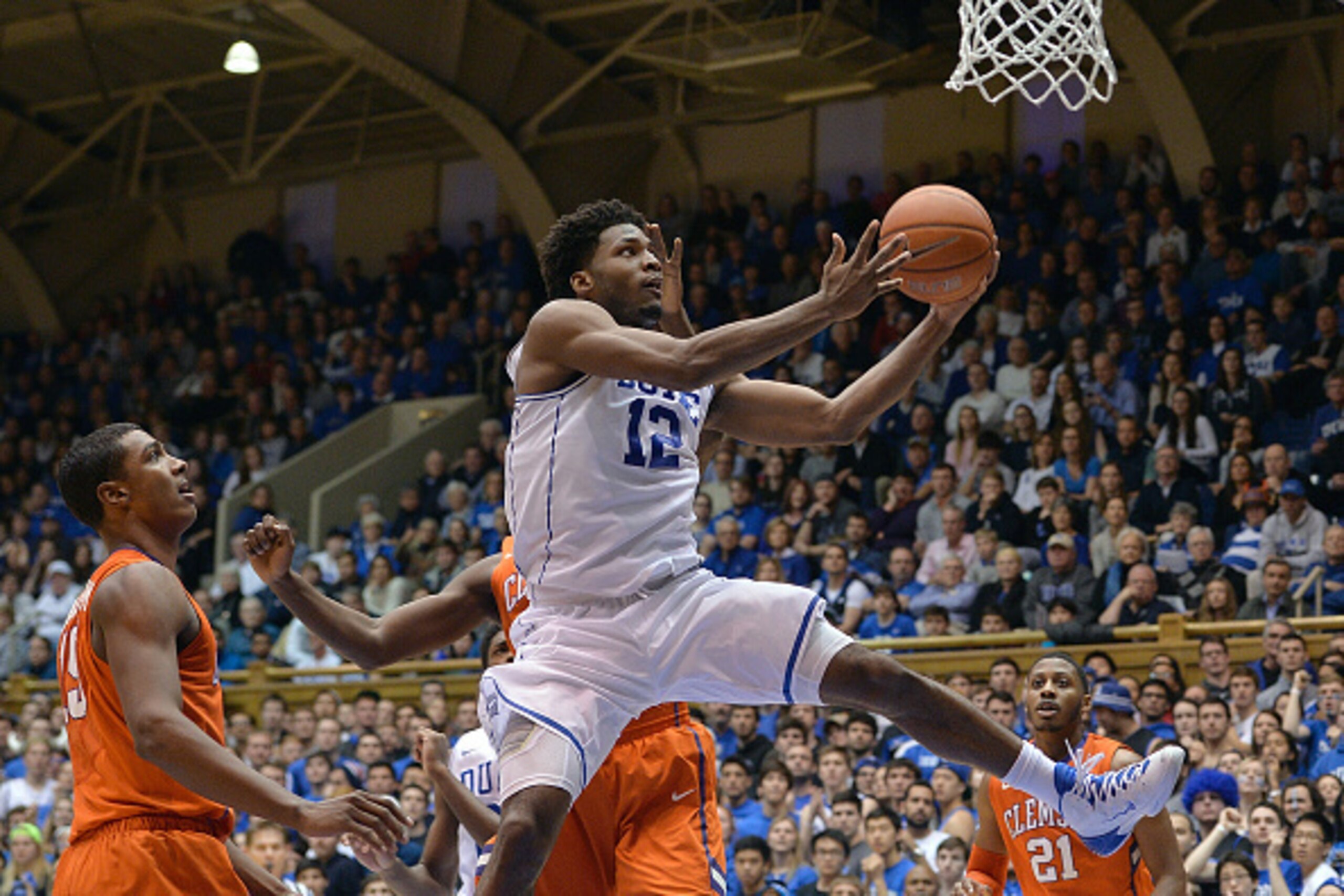 DURHAM, NC - FEBRUARY 21:  Justise Winslow #12 of the Duke Blue Devils drives through the Clemson Tigers defense during their game at Cameron Indoor Stadium on February 21, 2015 in Durham, North Carolina.  (Photo by Grant Halverson/Getty Images)
