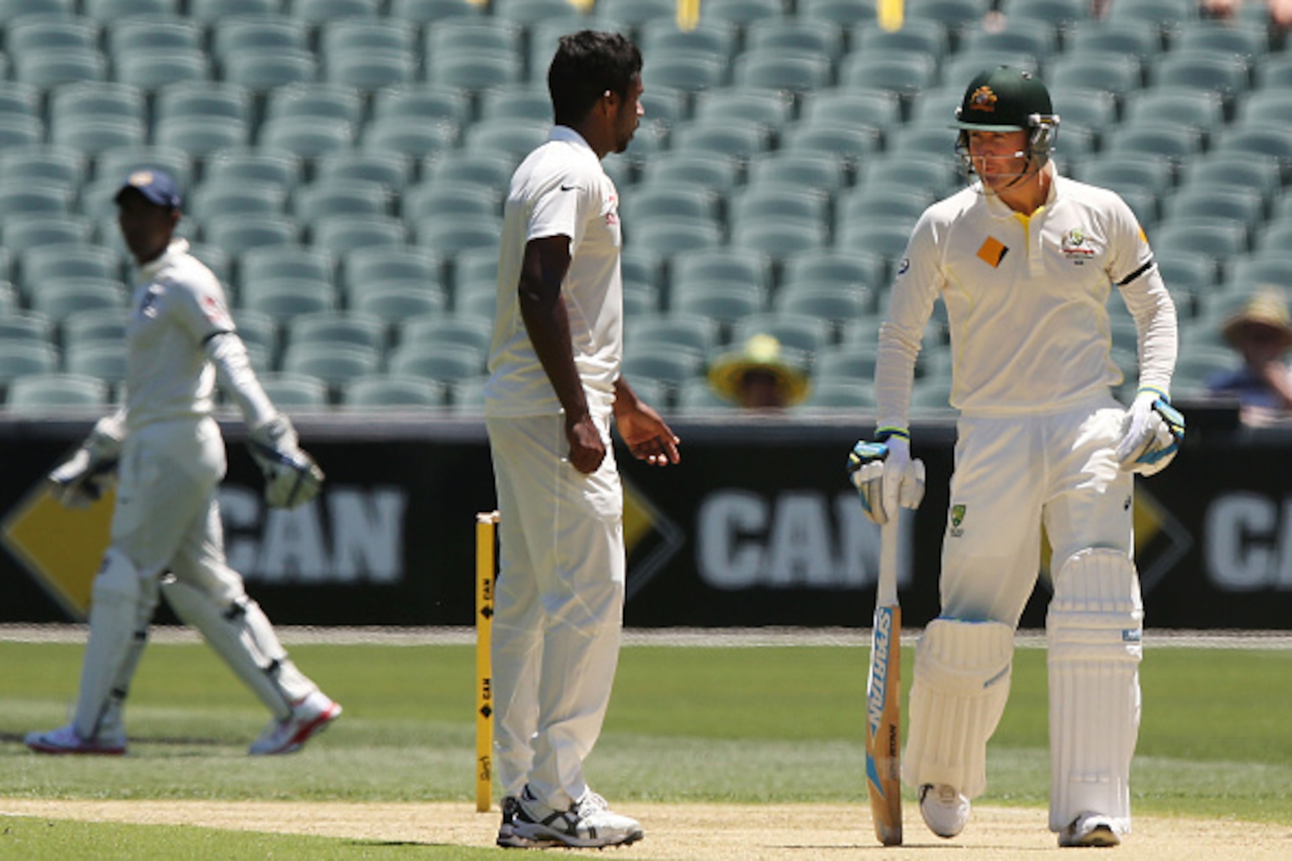 ADELAIDE, AUSTRALIA - DECEMBER 09:  Michael Clarke speaks to Varun Aaron of India after ducking a bouncer off his first bowl faced off during day one of the First Test match between Australia and India at Adelaide Oval on December 9, 2014 in Adelaide, Aus