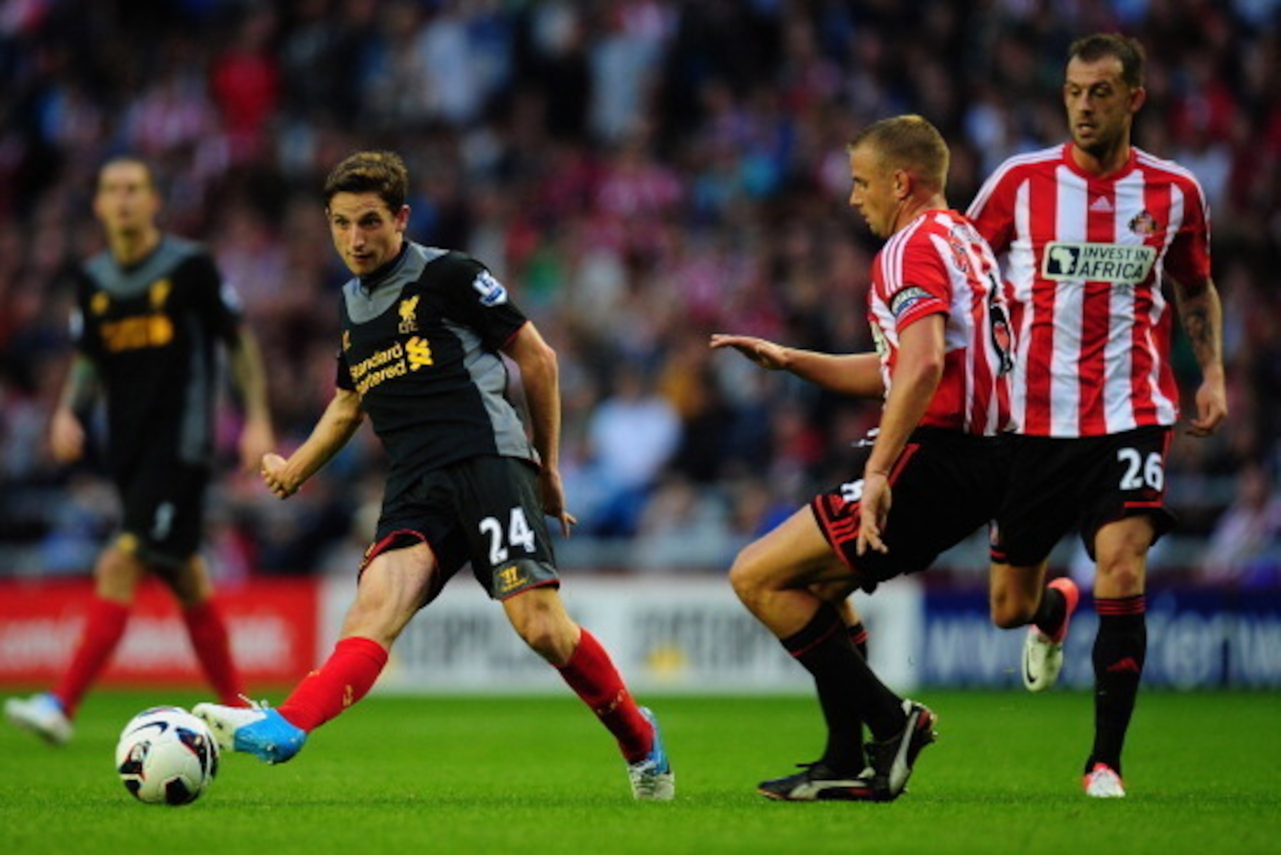 SUNDERLAND, ENGLAND - SEPTEMBER 15:  Liverpool player Joe Allen in action during the Barclays Premier league match between Sunderland and Liverpool at Stadium of Light on September 15, 2012 in Sunderland, England.  (Photo by Stu Forster/Getty Images)