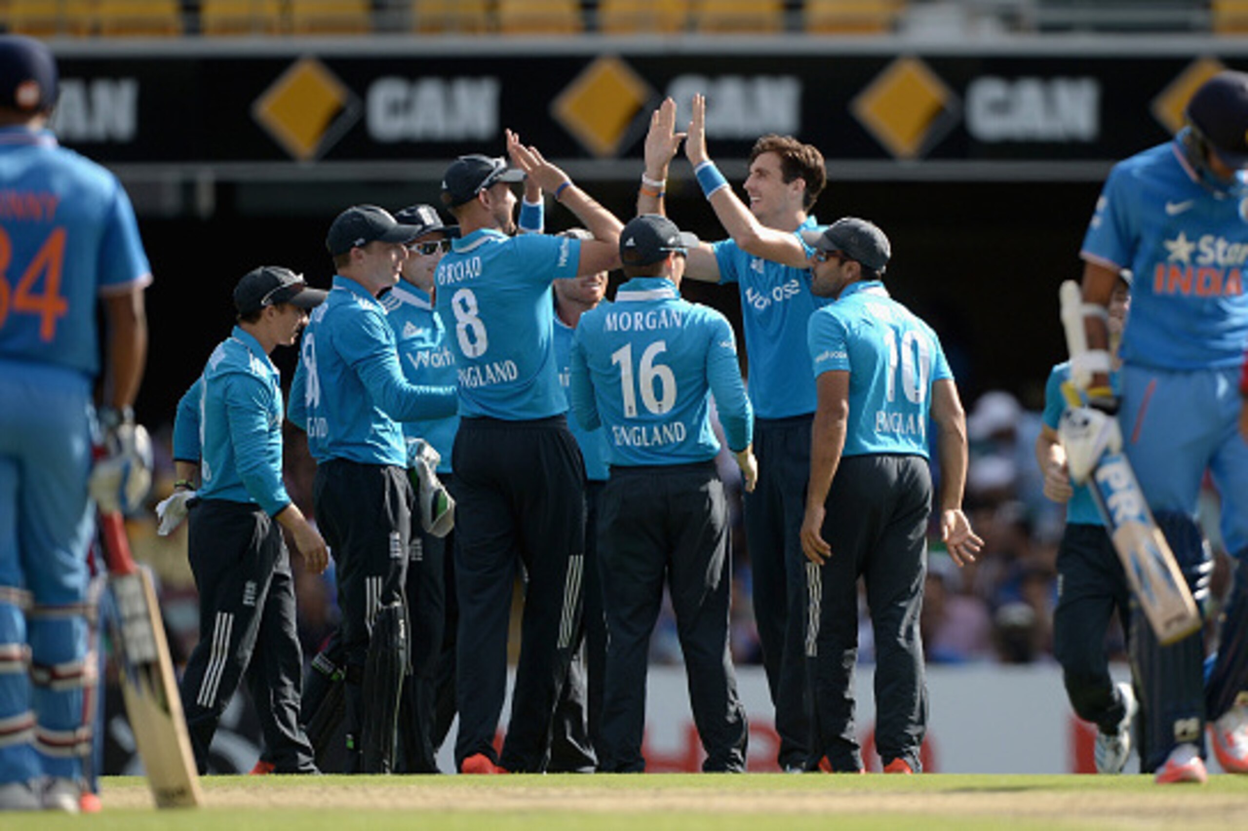 BRISBANE, AUSTRALIA - JANUARY 20:  Steven Finn of England celebrates with teammates after dismissing Axar Patel of India during the One Day International match between England and India at The Gabba on January 20, 2015 in Brisbane, Australia.  (Photo by G