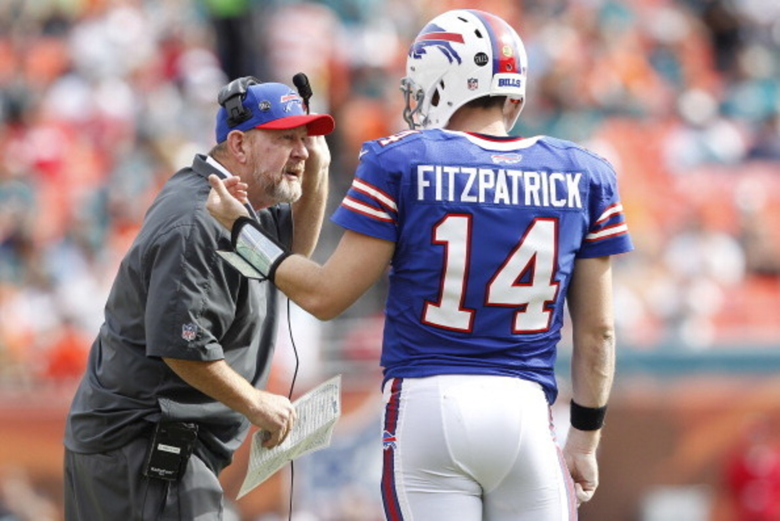 MIAMI GARDENS, FL - DECEMBER 23: Head coach Chan Gailey talks to Ryan Fitzpatrick #14 of the Buffalo Bills during a time out against the Miami Dolphins on December 23, 2012 at Sun Life Stadium in Miami Gardens, Florida. (Photo by Joel Auerbach/Getty Image
