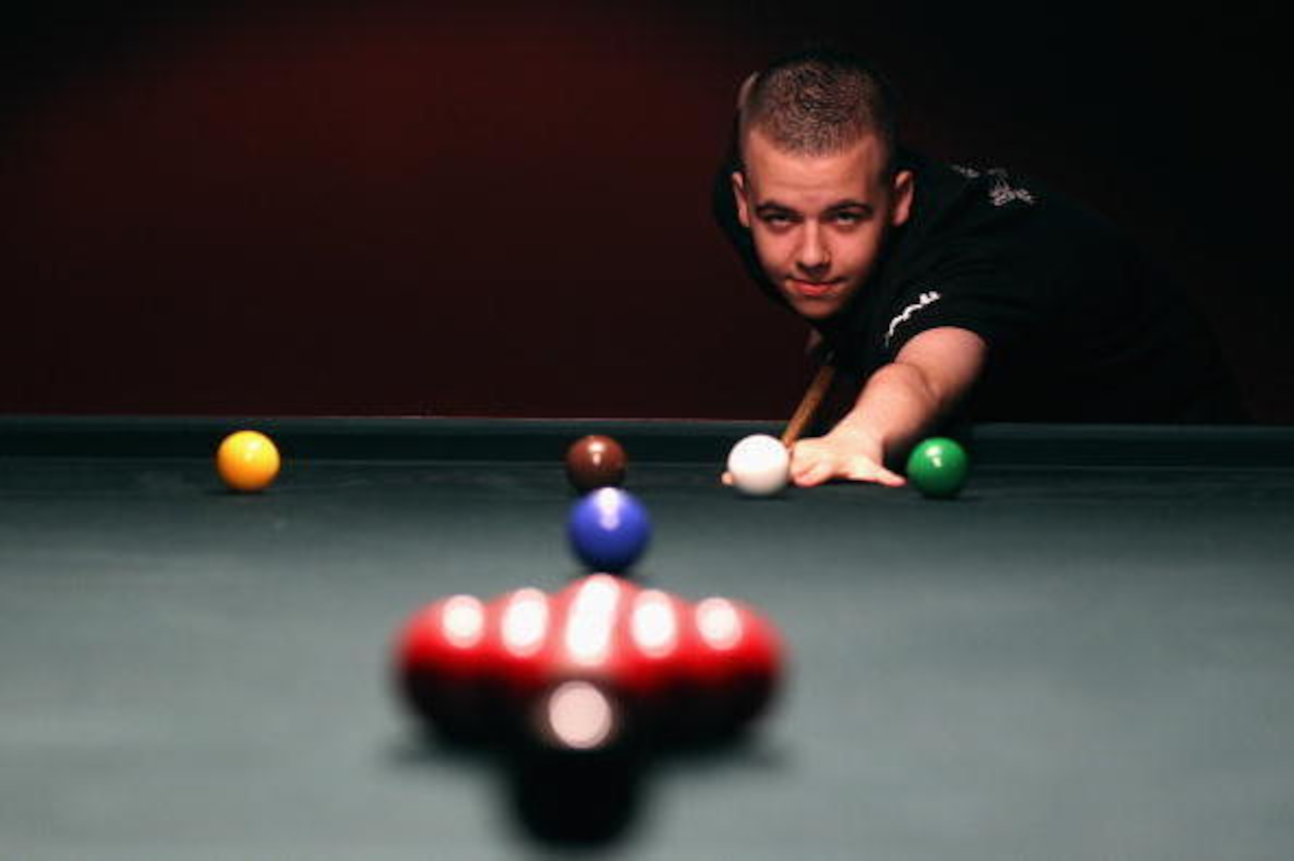 LONDON, ENGLAND - OCTOBER 05: Luca Brecel of Belgium poses during a media photocall to promote the launch of Power Snooker at Rileys Sports bar on October 5, 2010 in London, England.  (Photo by Clive Rose/Getty Images)