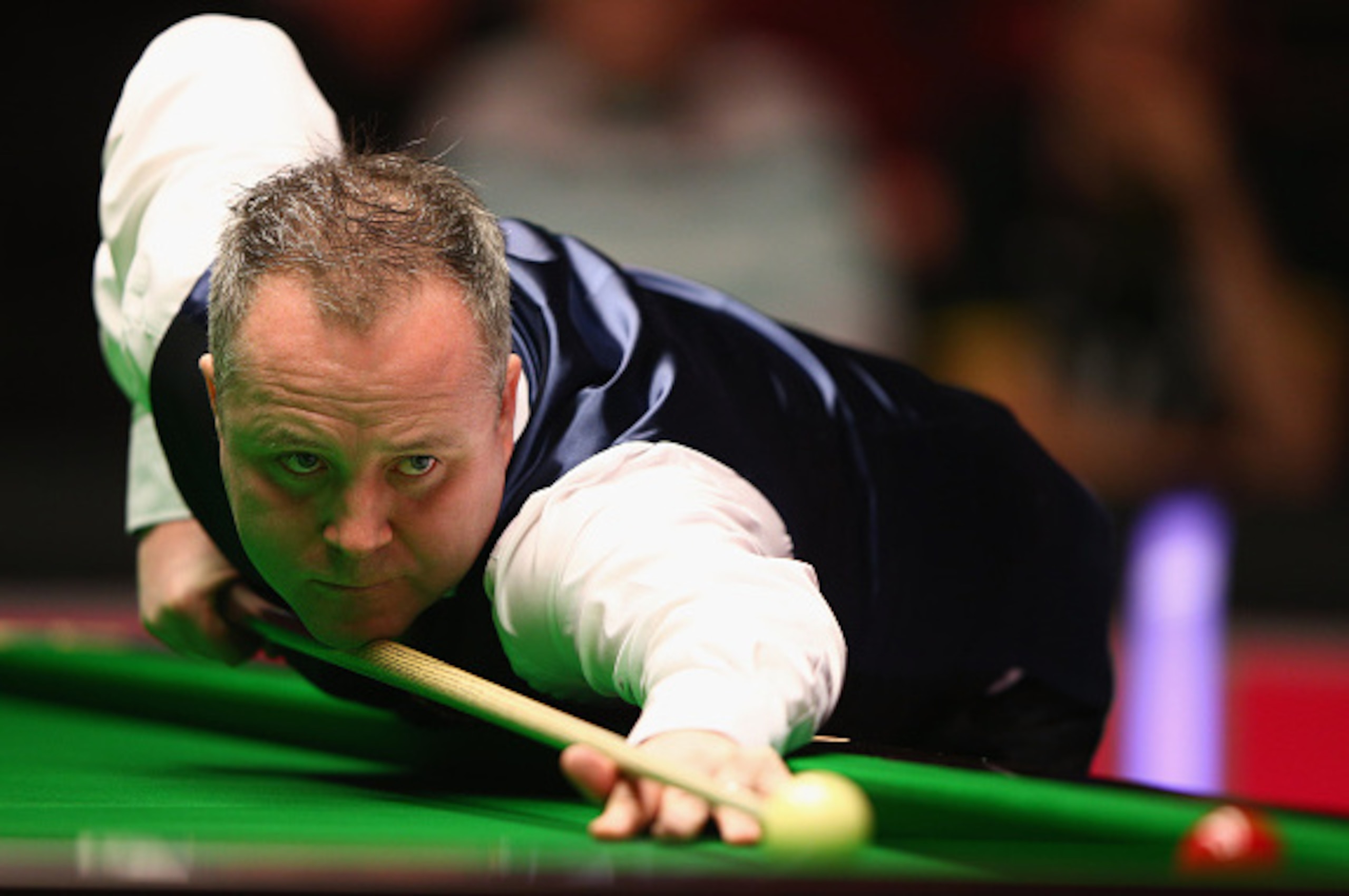 LONDON, ENGLAND - JANUARY 14:  John Higgins of Scotland plays a shot during his first round match against Mark Allen of  Northern Ireland on Day Four of the 2015 Dafabet Masters at Alexandra Palace on January 14, 2015 in London, England.  (Photo by Ian Wa