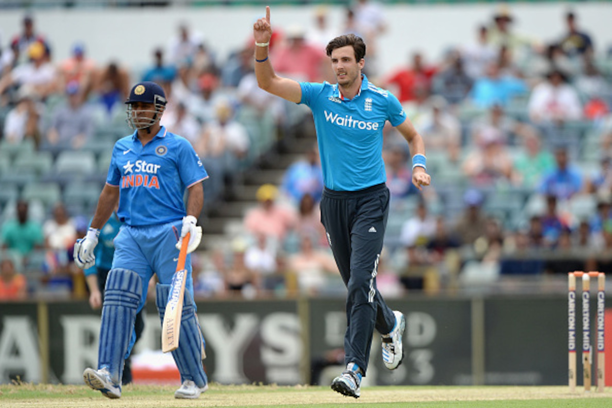 PERTH, AUSTRALIA - JANUARY 30:  Steven Finn of England celebrates dismissing Ajinkya Rahane of India during the One Day International match between England and India at WACA on January 30, 2015 in Perth, Australia.  (Photo by Gareth Copley/Getty Images)