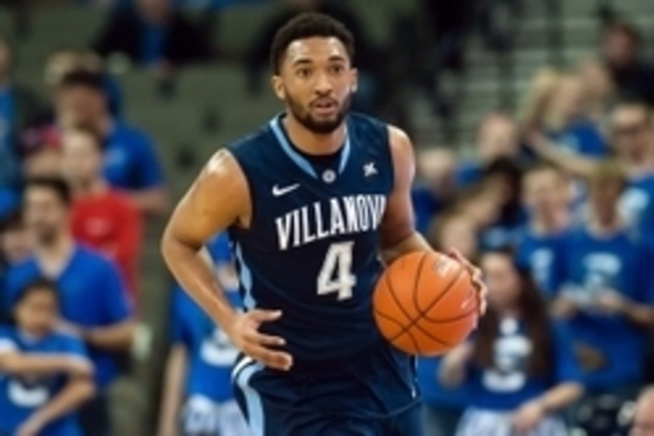 Mar 3, 2015; Omaha, NE, USA; Villanova Wildcats guard Darrun Hilliard II (4) dribbles against the Creighton Bluejays at CenturyLink Center Omaha. Villanova defeated Creighton 76-72. Mandatory Credit: Steven Branscombe-USA TODAY Sports