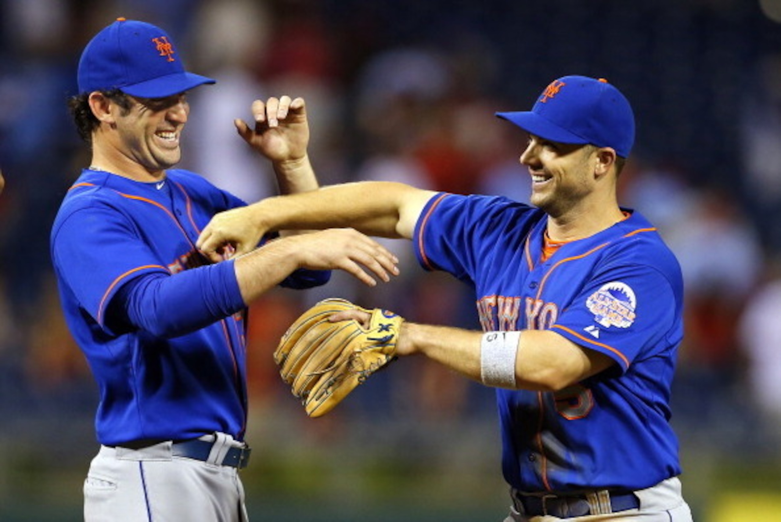 PHILADELPHIA, PA - JUNE 21: Matt Harvey #33 and David Wright #5 of the New York Mets goof around after defeating the Philadelphia Phillies 4-3 in an MLB baseball game on June 21, 2013 at Citizens Bank Park in Philadelphia, Pennsylvania. (Photo by Rich Sch