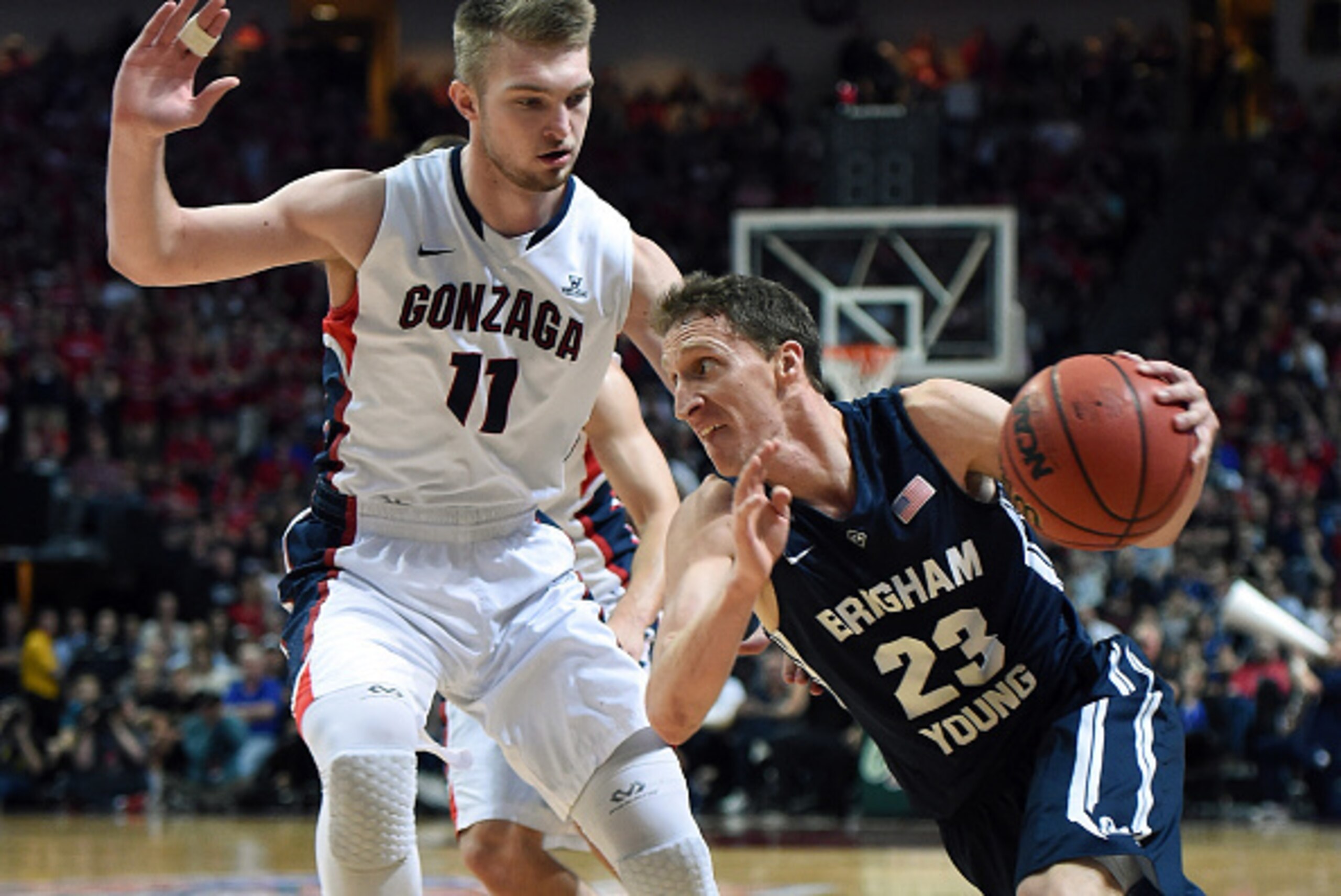 LAS VEGAS, NV - MARCH 10:  Skyler Halford #23 of the Brigham Young Cougars drives against Domantas Sabonis #11 of the Gonzaga Bulldogs during the championship game of the West Coast Conference Basketball tournament at the Orleans Arena on March 10, 2015 i