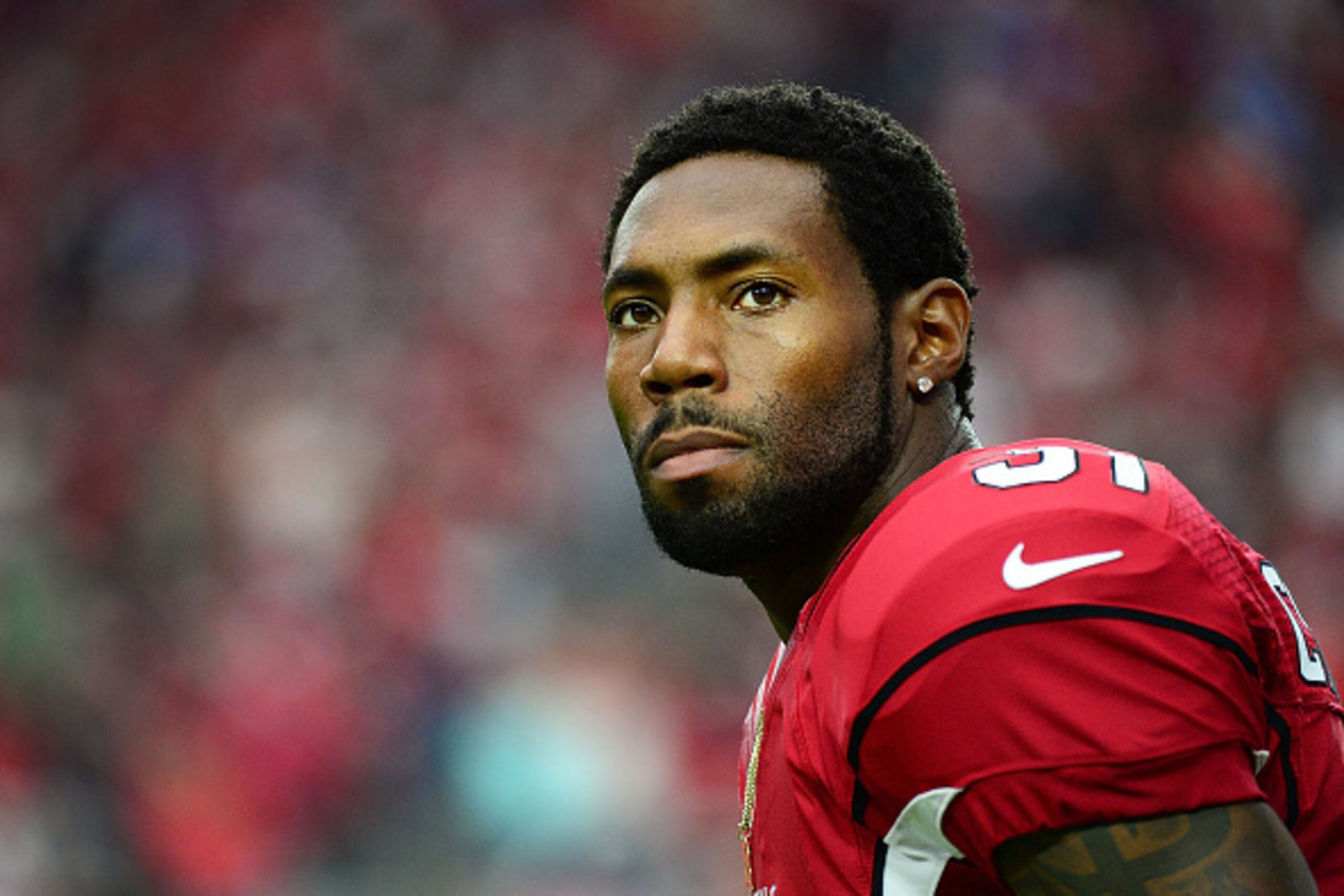 GLENDALE, AZ - DECEMBER 07:  Cornerback Antonio Cromartie #31 of the Arizona Cardinals looks off the field prior to the NFL game against the Kansas City Chiefs at University of Phoenix Stadium on December 7, 2014 in Glendale, Arizona.  (Photo by Jennifer 