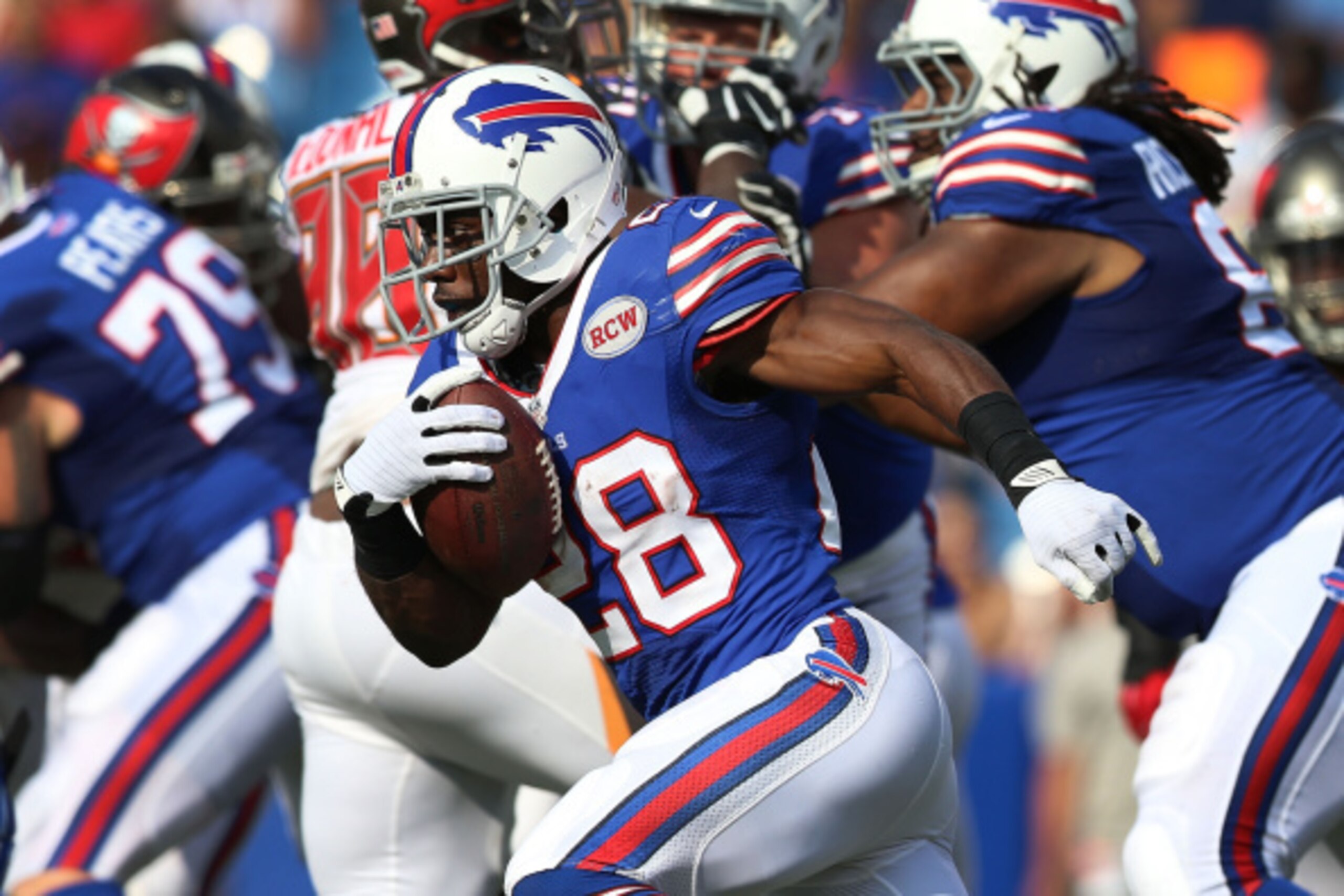 ORCHARD PARK, NY - AUGUST 23: C.J. Spiller #28 of the Buffalo Bills runs the ball against the Tampa Bay Buccaneers during the preseason game at Ralph Wilson Stadium on August 23, 2014 in Orchard Park, New York. (Photo by Vaughn Ridley/Getty Images) ORCHARD PARK, NY - AUGUST 23: C.J. Spiller #28 of the Buffalo Bills runs the ball against the Tampa Bay Buccaneers during the preseason game at Ralph Wilson Stadium on August 23, 2014 in Orchard Park, New York. (Photo by Vaughn Ridley/Getty Images)