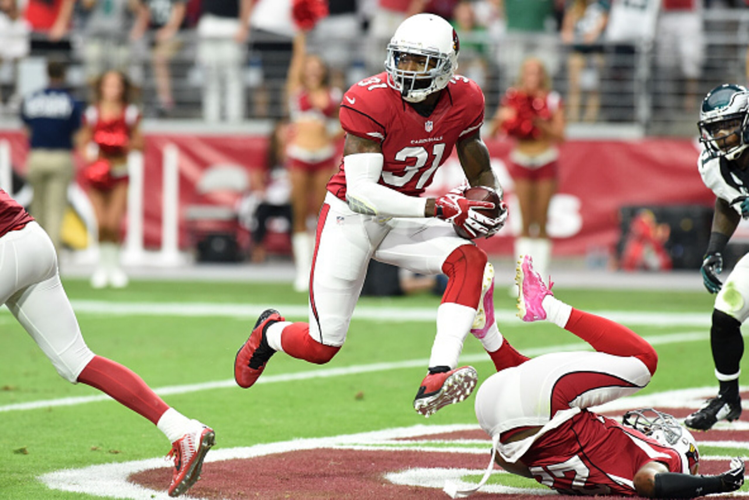 GLENDALE, AZ - OCTOBER 26: Cornerback Antonio Cromartie #31 of the Arizona Cardinals runs the football after making an interception against the Philadelphia Eagles in the first half at University of Phoenix Stadium on October 26, 2014 in Glendale, Arizon GLENDALE, AZ - OCTOBER 26: Cornerback Antonio Cromartie #31 of the Arizona Cardinals runs the football after making an interception against the Philadelphia Eagles in the first half at University of Phoenix Stadium on October 26, 2014 in Glendale, Arizon