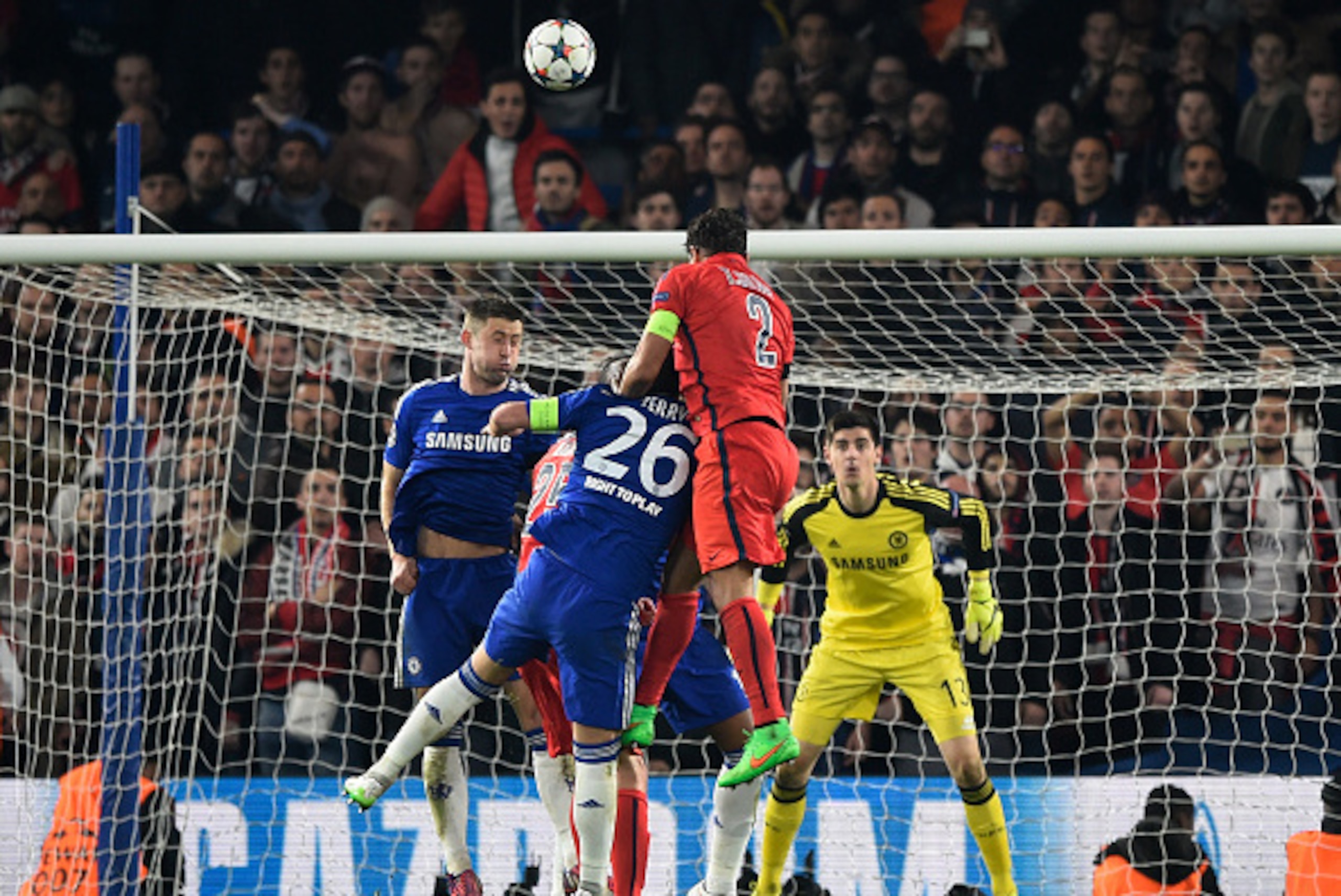 LONDON, ENGLAND - MARCH 11:  Thiago Silva #2 of PSG rises above John Terry of Chelsea to score a goal to level the scores at 2-2 during the UEFA Champions League Round of 16, second leg match between Chelsea and Paris Saint-Germain at Stamford Bridge on M