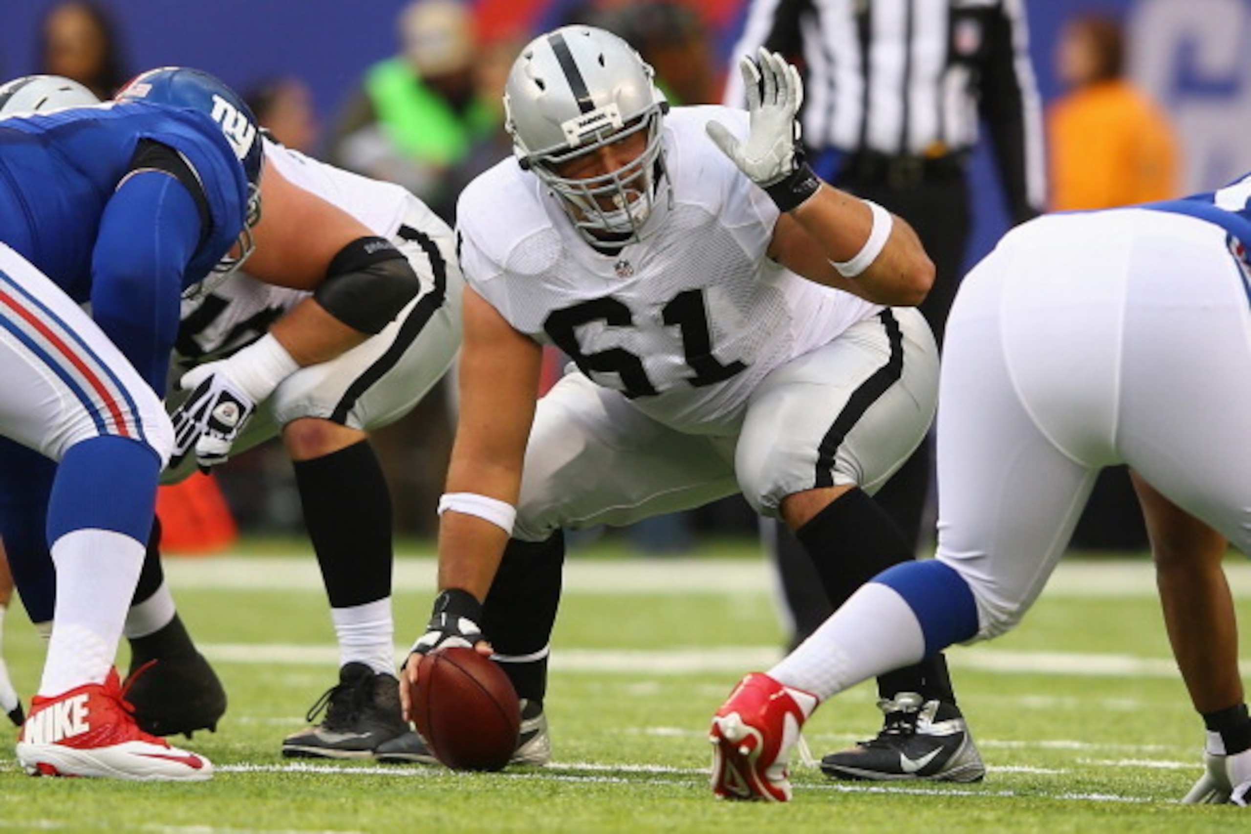 EAST RUTHERFORD, NJ - NOVEMBER 10:  Stefen Wisniewski #61 of the Oakland Raiders in action against the New York Giants during their game at MetLife Stadium on November 10, 2013 in East Rutherford, New Jersey.  (Photo by Al Bello/Getty Images)