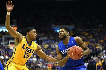 BATON ROUGE, LA - FEBRUARY 10:  Andrew Harrison #5 of the Kentucky Wildcats is defended by Jalyn Patterson #15 of the LSU Tigers during the second half of a game at the Pete Maravich Assembly Center on February 10, 2015 in Baton Rouge, Louisiana.  (Photo 
