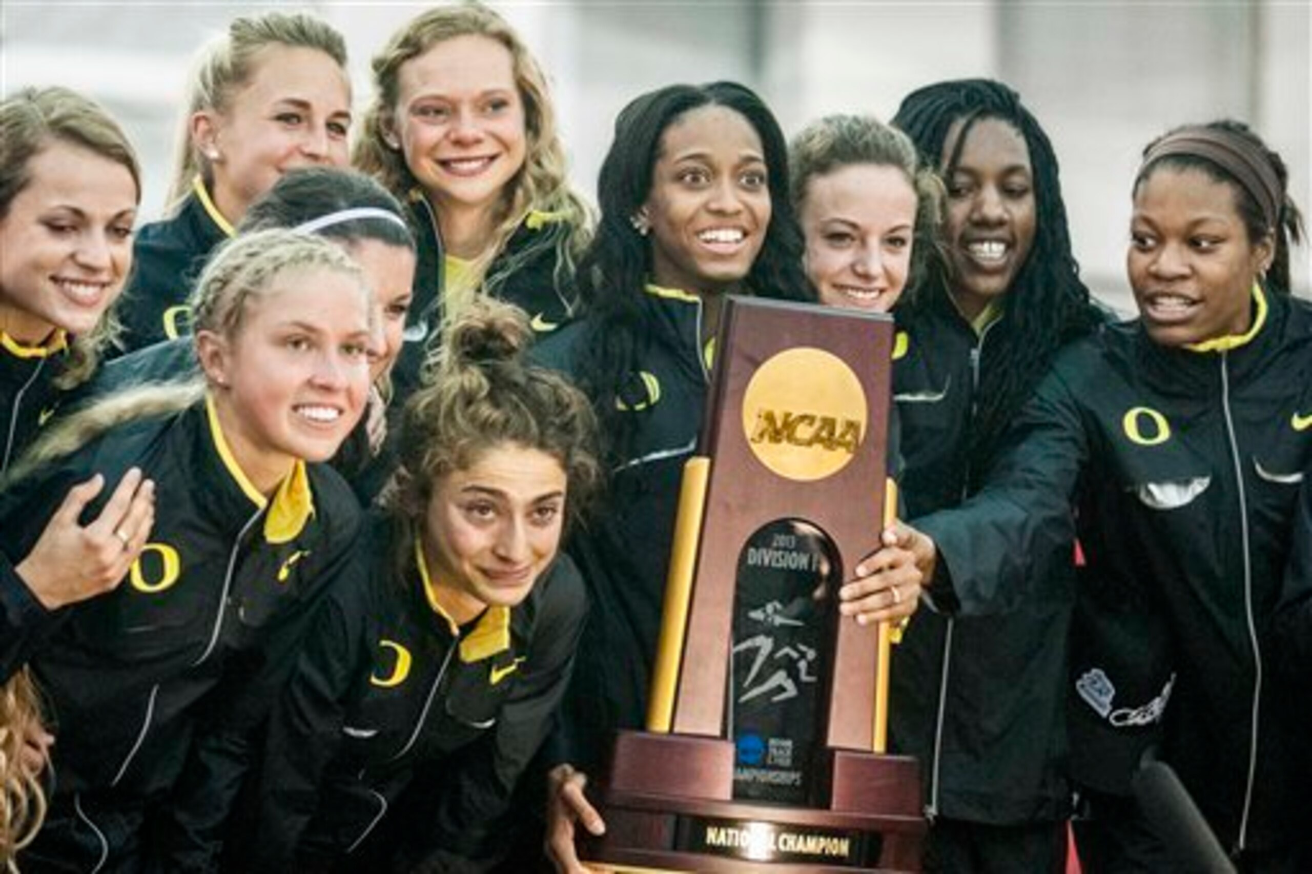Oregon women celebrating their team win in 2013.
