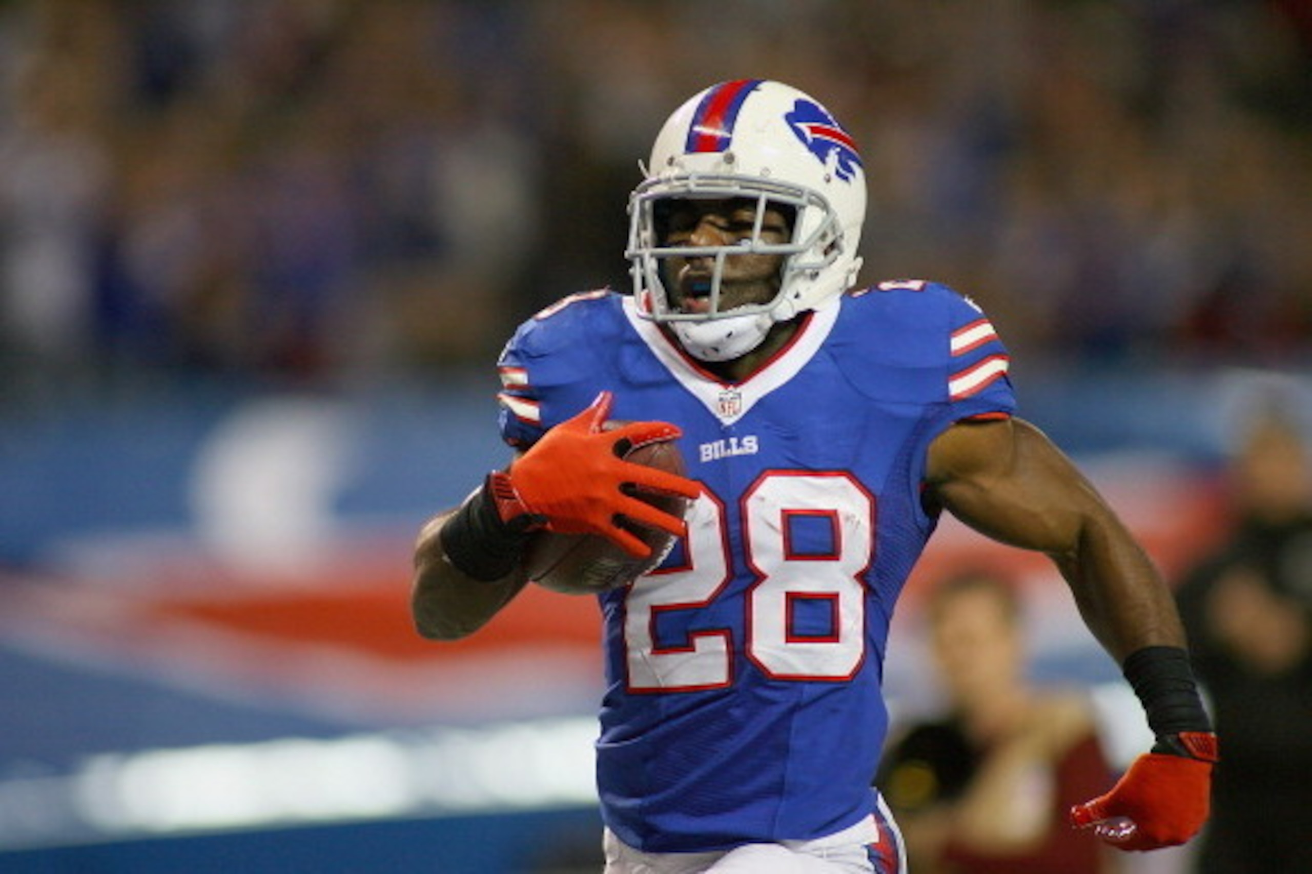 TORONTO, ON - DECEMBER 01:  C.J. Spiller #28 of the Buffalo Bills runs for a 36 yard touchdown in the fourth quarter against the Atlanta Falcons at Rogers Centre on December 1, 2013 in Toronto, Ontario.Atlanta won 34-31 in overtime.  (Photo by Rick Stewar