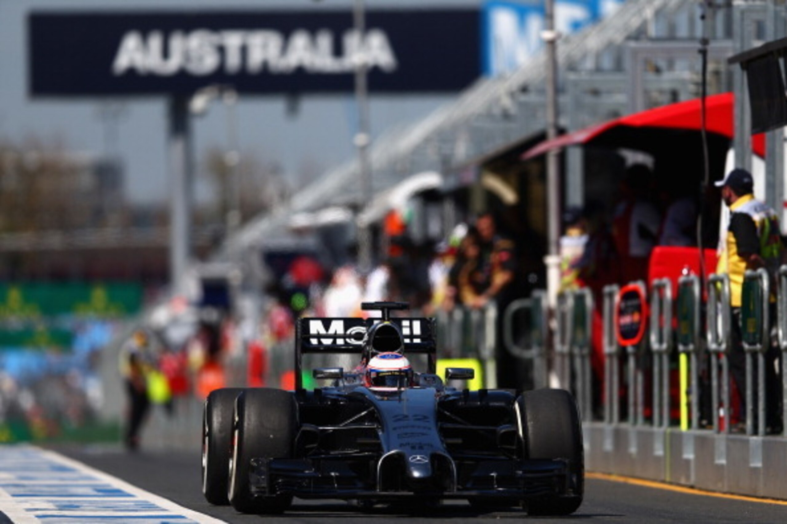 MELBOURNE, AUSTRALIA - MARCH 14:  Jenson Button of Great Britain and McLaren drives down the pitlane during practice for the Australian Formula One Grand Prix at Albert Park on March 14, 2014 in Melbourne, Australia.  (Photo by Clive Mason/Getty Images)