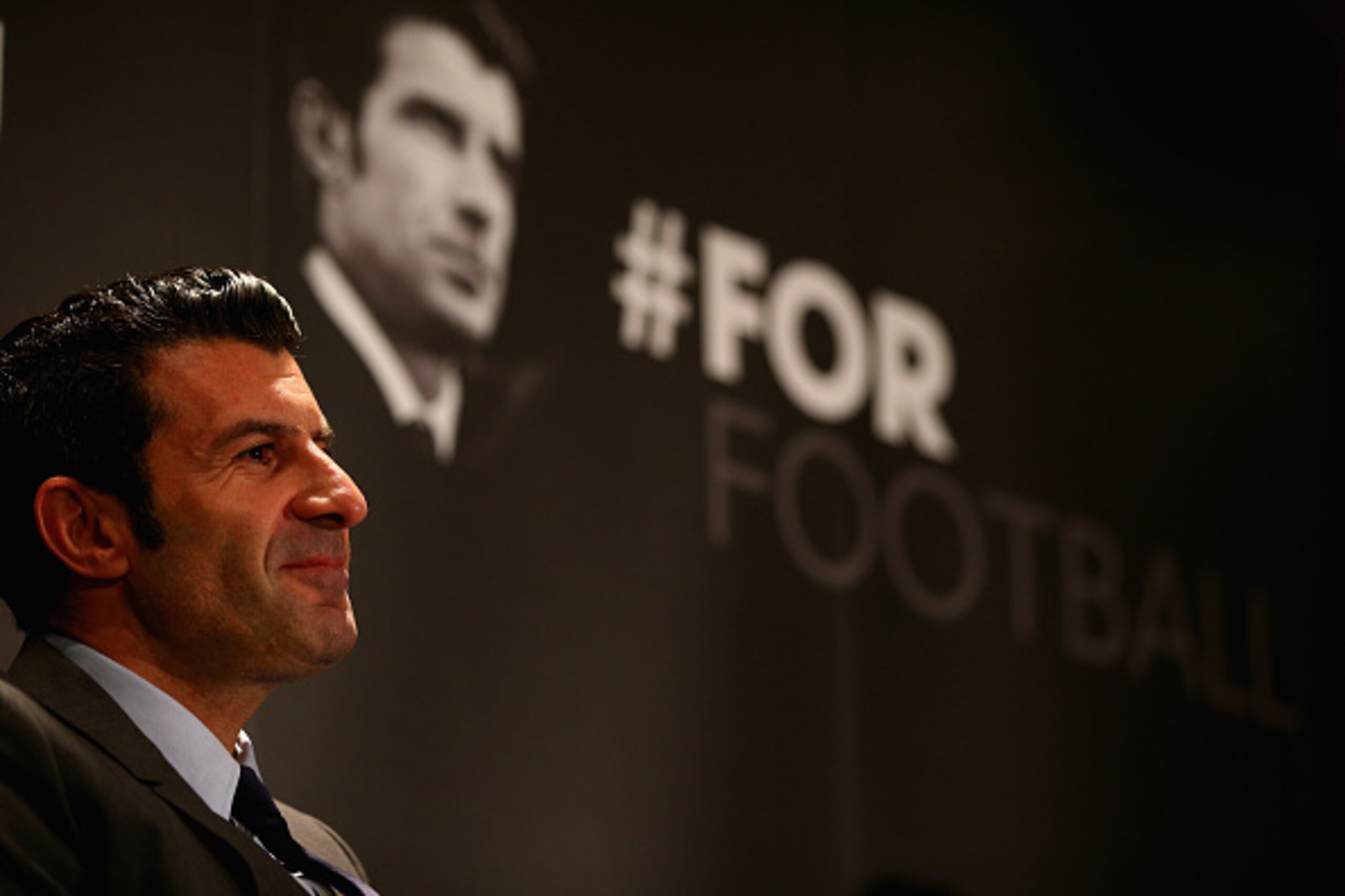 LONDON, ENGLAND - FEBRUARY 19: Luis Figo talks to the media as he launches his FIFA Presidential Campaign Manifesto at Wembley Stadium on February 19, 2015 in London, England. (Photo by Paul Gilham/Getty Images) LONDON, ENGLAND - FEBRUARY 19: Luis Figo talks to the media as he launches his FIFA Presidential Campaign Manifesto at Wembley Stadium on February 19, 2015 in London, England. (Photo by Paul Gilham/Getty Images)