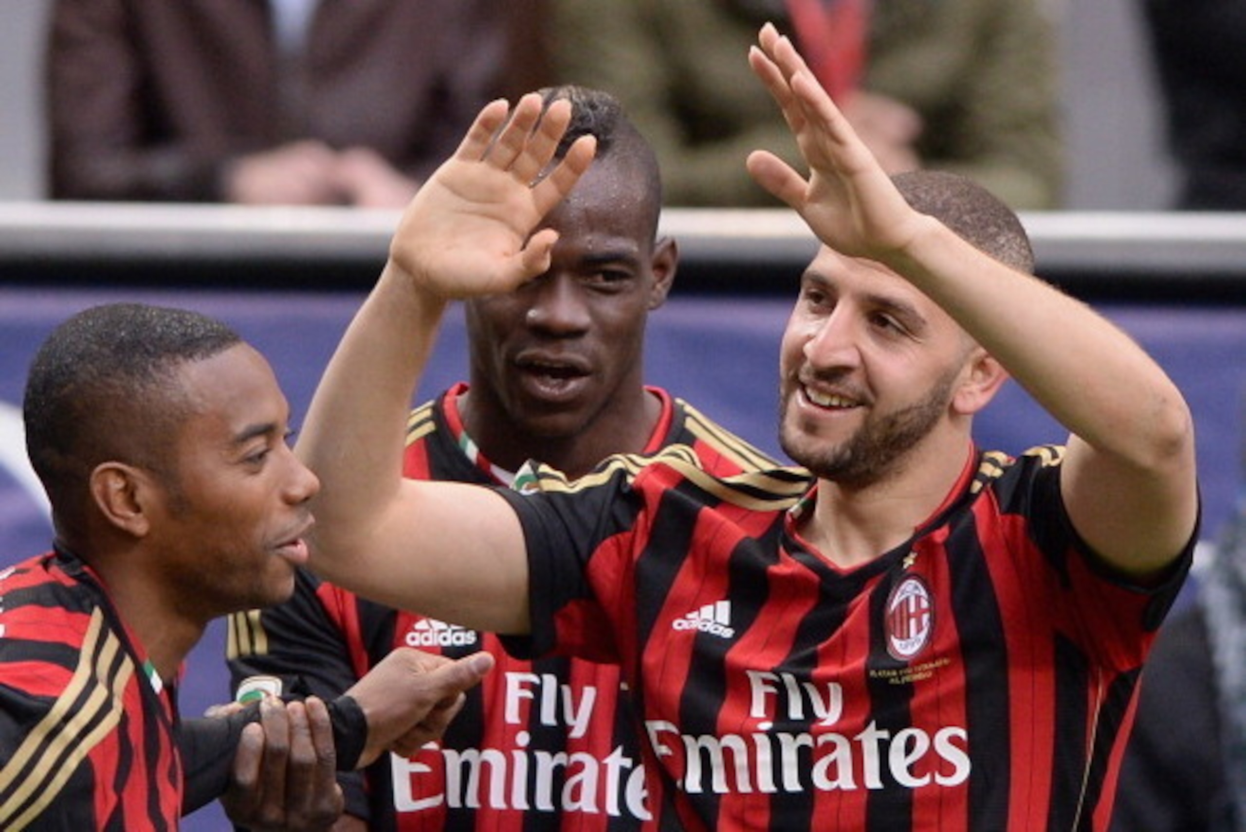 MILAN, ITALY - APRIL 19:  Adel Taarabt of AC Milan (R) celebrates scoring the second goal during the Serie A match between AC Milan and AS Livorno Calcio at San Siro Stadium on April 19, 2014 in Milan, Italy.  (Photo by Claudio Villa/Getty Images)