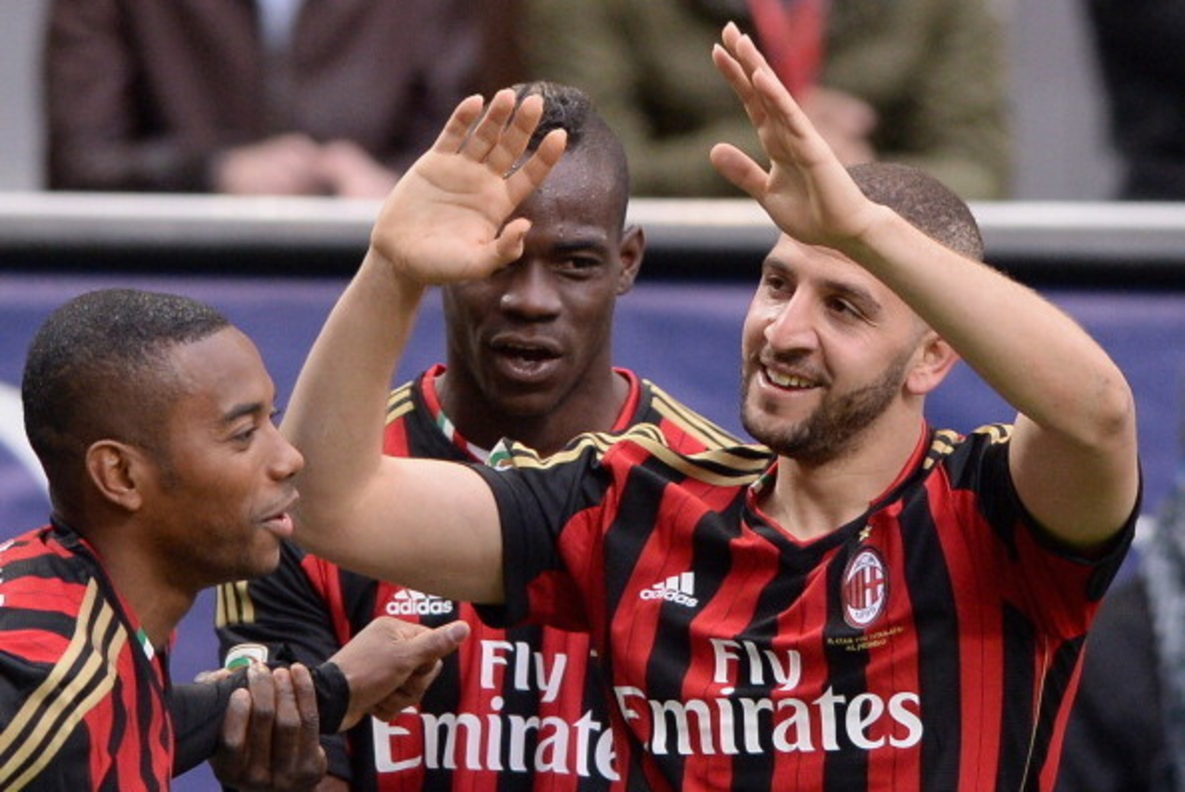 MILAN, ITALY - APRIL 19:  Adel Taarabt of AC Milan (R) celebrates scoring the second goal during the Serie A match between AC Milan and AS Livorno Calcio at San Siro Stadium on April 19, 2014 in Milan, Italy.  (Photo by Claudio Villa/Getty Images)
