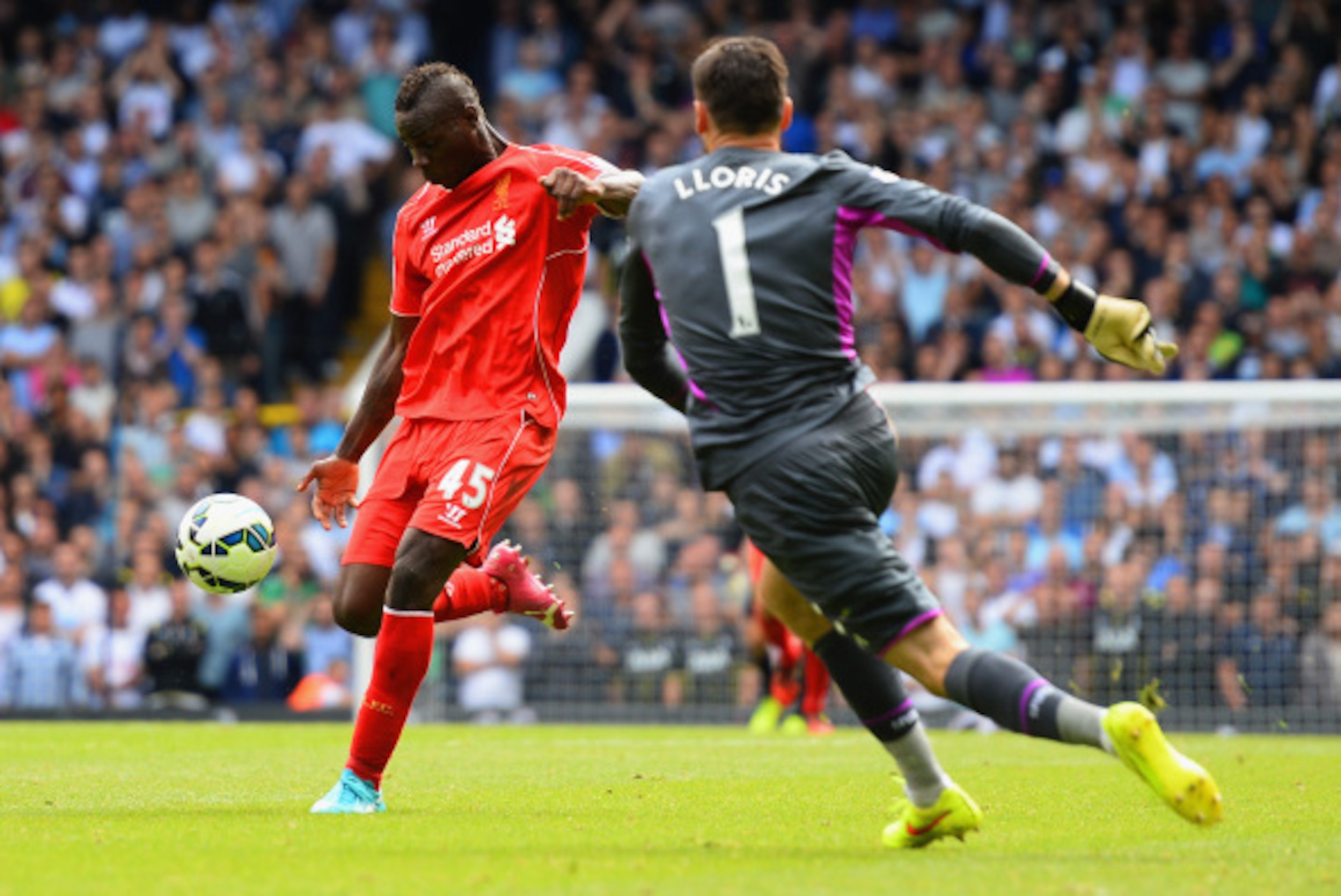 LONDON, ENGLAND - AUGUST 31:  Mario Balotelli of Liverpool shoots at an open goal past Hugo Lloris of Spurs during the Barclays Premier League match between Tottenham Hotspur and Liverpool at White Hart Lane on August 31, 2014 in London, England.  (Photo 