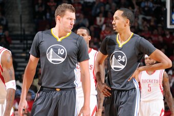 HOUSTON, TX - JANUARY 17: David Lee #10 and Shaun Livingston #34 of the Golden State Warriors during the game on January 17, 2015 at the Toyota Center in Houston, Texas. NOTE TO USER: User expressly acknowledges and agrees that, by downloading and or usin