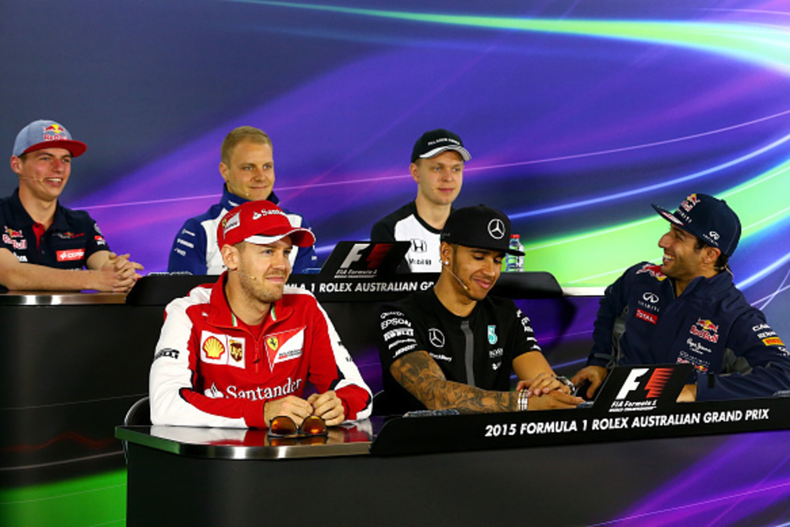 MELBOURNE, AUSTRALIA - MARCH 12:  (L-R front) Sebastian Vettel of Germany and Ferrari, Lewis Hamilton of Great Britain and Mercedes GP and Daniel Ricciardo of Australia and Infiniti Red Bull Racing and (L-R back) Max Verstappen of Netherlands and Scuderia