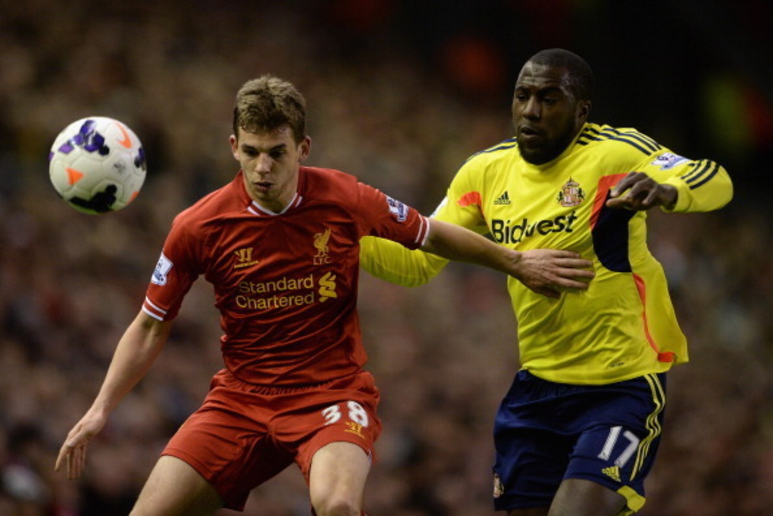 LIVERPOOL, ENGLAND - MARCH 26:  Jon Flanagan of Liverpool competes with Jozy Altidore of Sunderland
 during the Barclays Premier League match between Liverpool and Sunderland at Anfield on March 26, 2014 in Liverpool, England.  (Photo by Michael Regan/Get