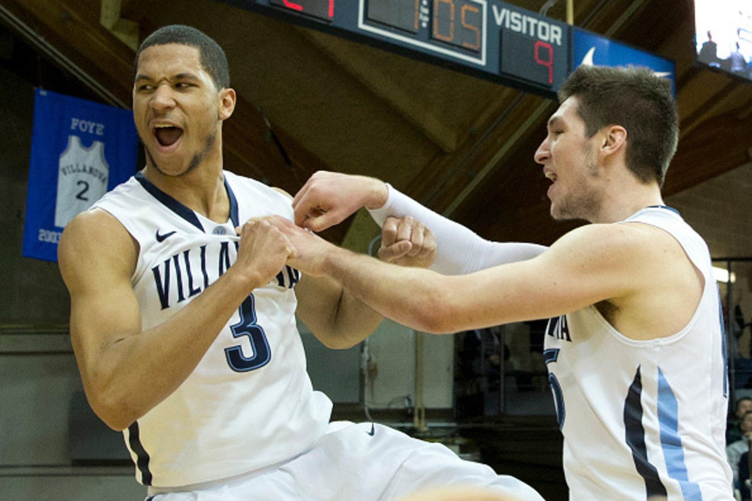 VILLANOVA, PA - JANUARY 10: Josh Hart #3 and Ryan Arcidiacono #15 of the Villanova Wildcats react after Hart played the ball off a DePaul Blue Demons player to earn possession for the Wildcats on January 10, 2015 at the the Pavilion in Villanova, Pennsylv