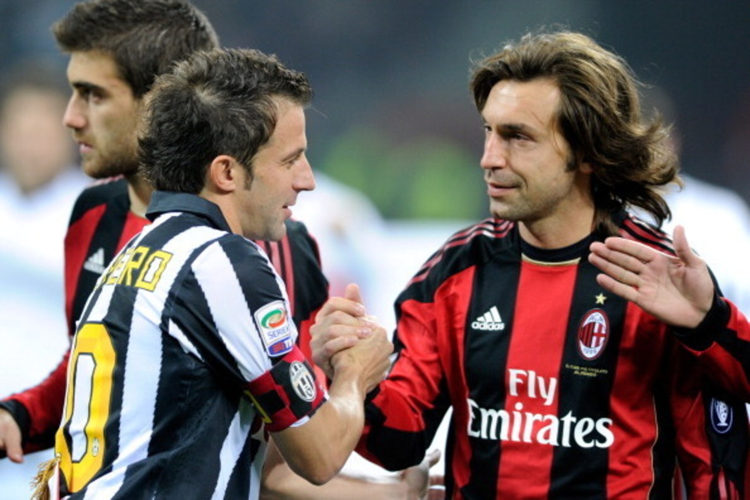 MILAN, ITALY - OCTOBER 30:  Andrea Pirlo of AC Milan and Alessandro Del Piero of Juventus FC during the Serie A match between Milan and Juventus at Stadio Giuseppe Meazza on October 30, 2010 in Milan, Italy.  (Photo by Claudio Villa/Getty Images)