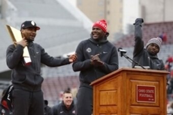 Jan 24, 2015; Columbus, OH, USA; Ohio State Buckeyes quarterback Braxton Miller (left) and quarterback Cardale Jones (middle) and Buckeyes quarterback J.T. Barrett (right) at the national championship celebration at Ohio Stadium. Mandatory Credit: Joe Mai