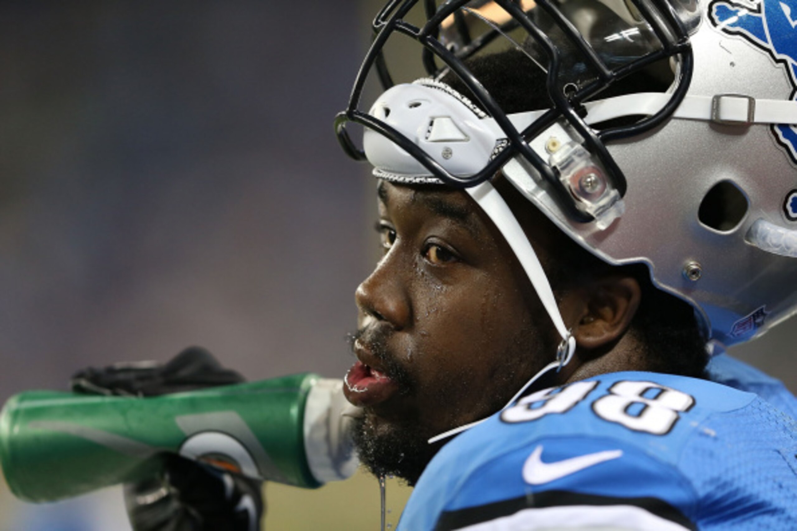 DETROIT, MI - AUGUST 22:  Nick Fairley #98 of the Detroit Lions watches the action from the sidelines during the first quarter of the preseason game against the Jacksonville Jaguars at Ford Field on August 22, 2014 in Detroit, Michigan. The Lions defeated