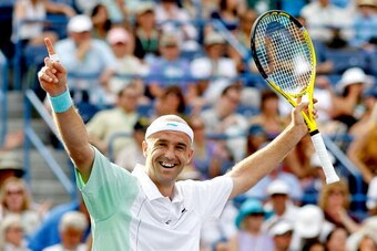 INDIAN WELLS, CA - MARCH 21:  Ivan Ljubicic of Croatia celebrates match point against Andy Roddick during the final of the BNP Paribas Open on March 21, 2010 at the Indian Wells Tennis Garden in Indian Wells, California.  (Photo by Matthew Stockman/Getty 