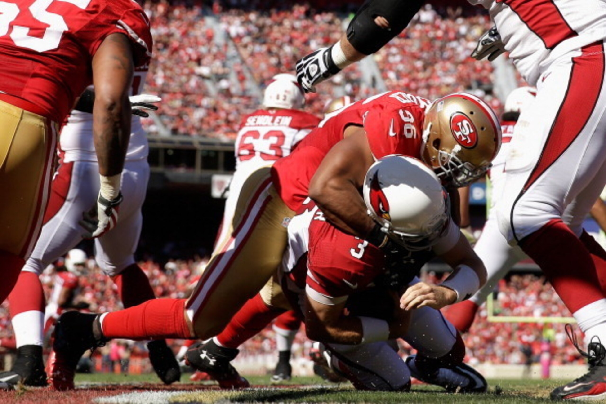 SAN FRANCISCO, CA - OCTOBER 13:  Corey Lemonier #96 of the San Francisco 49ers sacks Carson Palmer #3 of the Arizona Cardinals in the endzone at Candlestick Park on October 13, 2013 in San Francisco, California.  (Photo by Ezra Shaw/Getty Images)