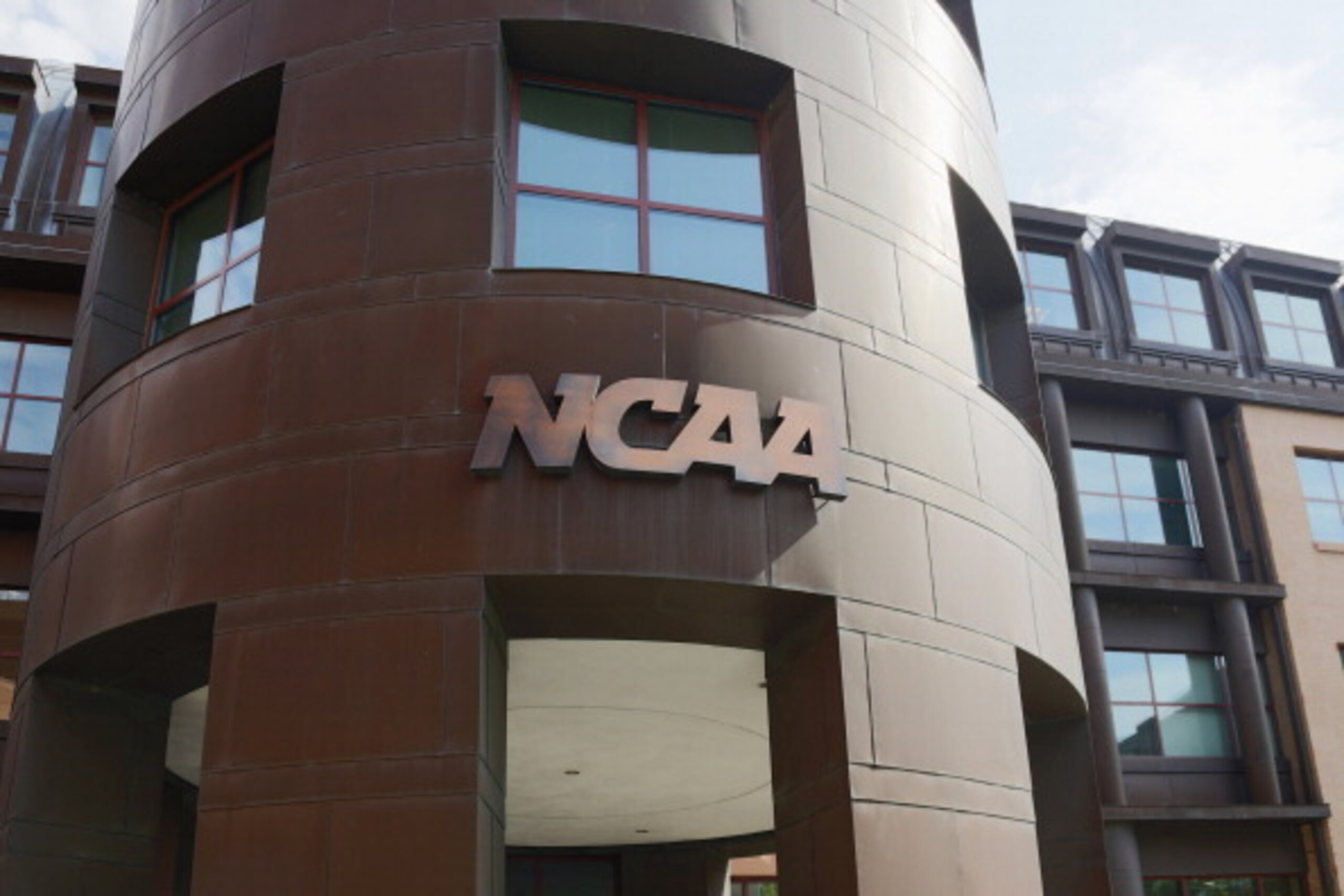 INDIANAPOLIS, IN - JULY 23: The entrance to the NCAA's headquarters is seen following an announcement of sanctions against Penn State University's football program on July 23, 2012 in Indianapolis, Indiana. The sanctions are a result of a report that the 