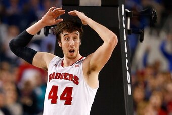 ARLINGTON, TX - APRIL 05:  Frank Kaminsky #44 of the Wisconsin Badgers reacts to a call during the NCAA Men's Final Four Semifinal against the Kentucky Wildcats at AT&T Stadium on April 5, 2014 in Arlington, Texas.  (Photo by Tom Pennington/Getty Images)