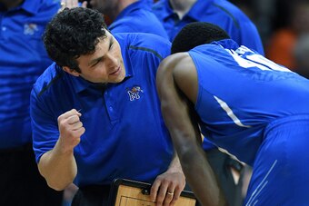 LAS VEGAS, NV - NOVEMBER 28:  Head coach Josh Pastner of the Memphis Tigers talks with Calvin Godfrey #40 during their game against the Indiana State Sycamores during the 2014 Continental Tire Las Vegas Invitational basketball tournament at the Orleans Ar