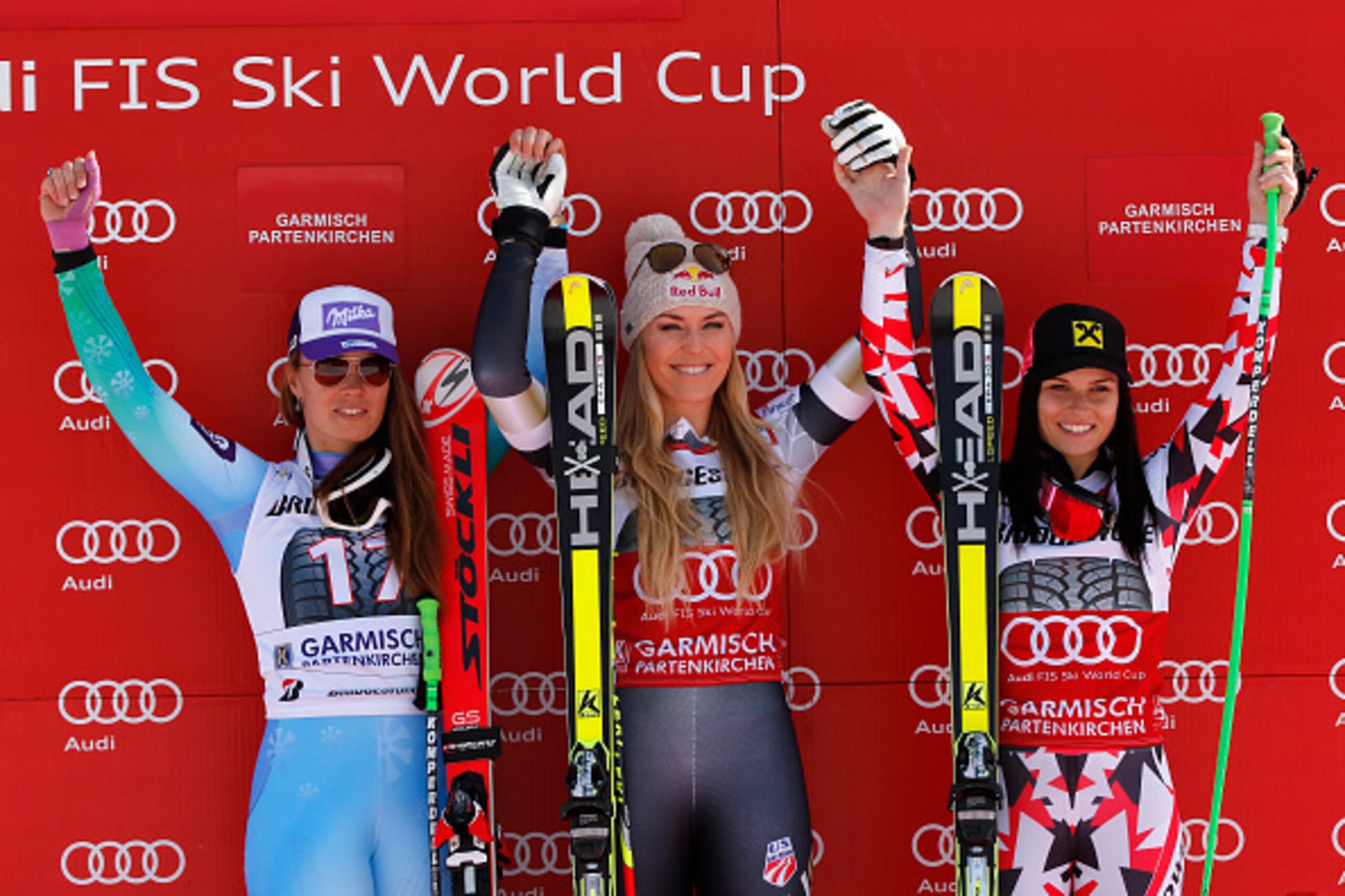 GARMISCH-PARTENKIRCHEN, GERMANY - MARCH 08: (FRANCE OUT) Lindsey Vonn of the USA takes the 1st place,Tina Maze of Slovenia takes the 2nd place,Anna Fenninger of Austria takes the 3rd place during the Audi FIS Alpine Ski World Cup Women's Super G on March 