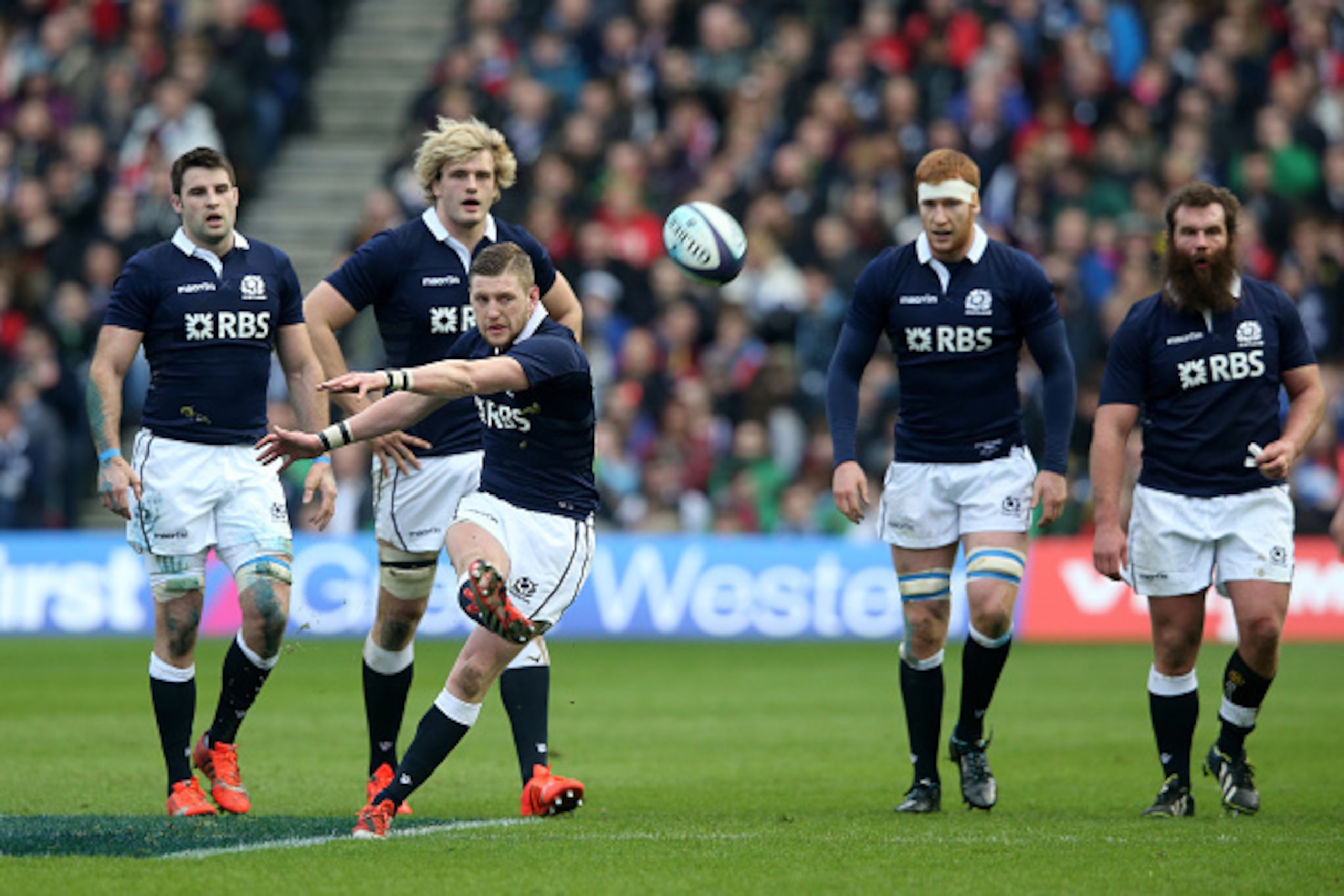 EDINBURGH, SCOTLAND - FEBRUARY 15:  Finn Russell of Scotland kicks for touch during the RBS Six Nations match between Scotland and Wales at Murrayfield Stadium on February 15, 2015 in Edinburgh, Scotland.  (Photo by David Rogers/Getty Images)