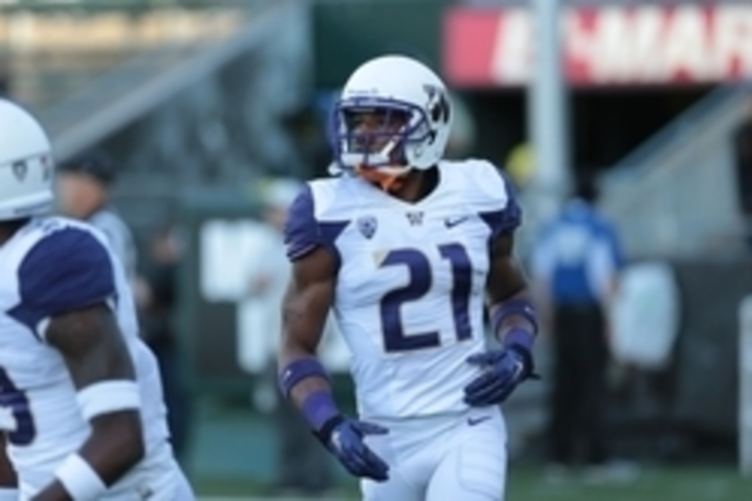 Oct 18, 2014; Eugene, OR, USA; Washington Huskies defensive back Marcus Peters (21) runs on the field before the game against the Oregon Ducksat Autzen Stadium. Mandatory Credit: Scott Olmos-USA TODAY Sports