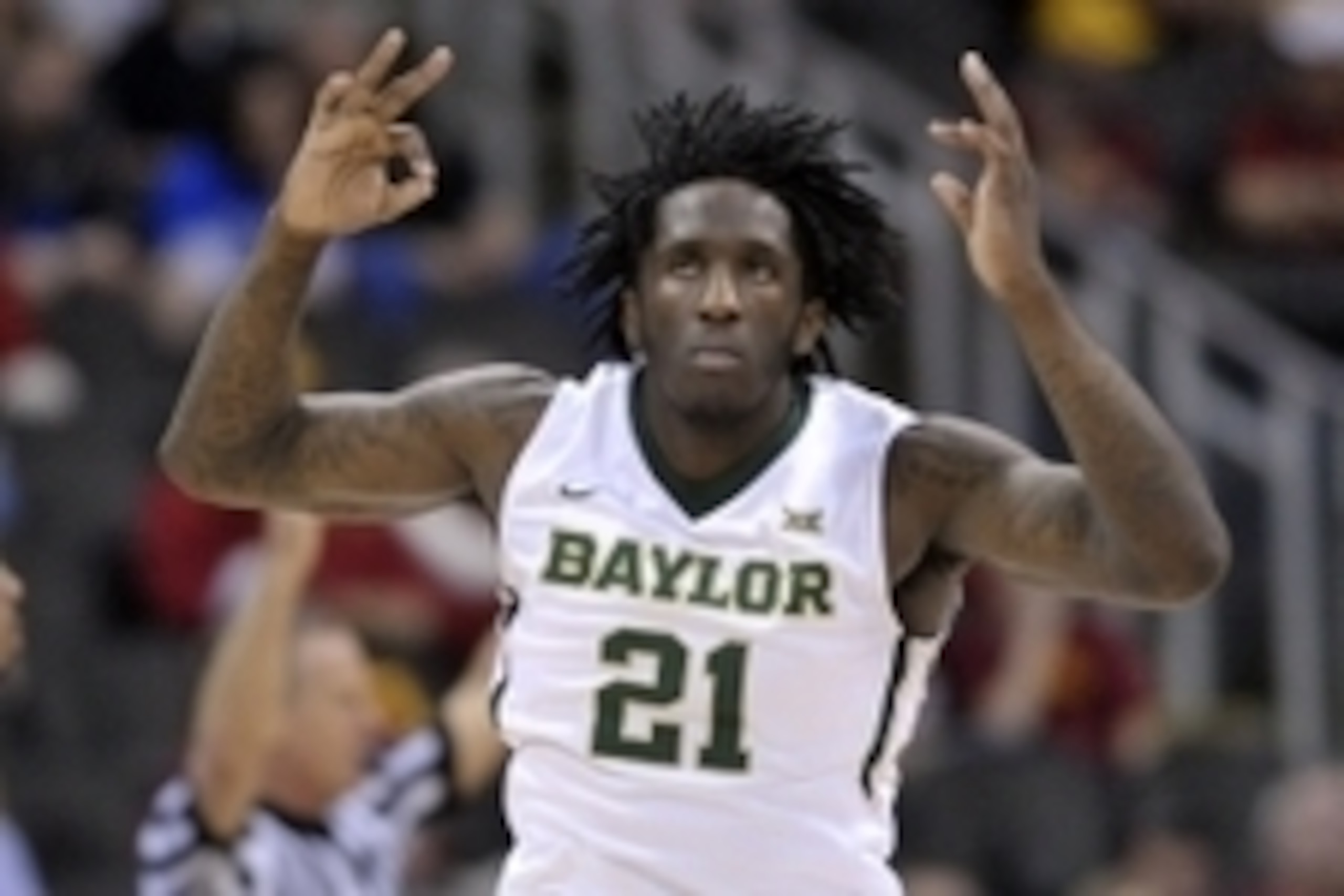 Mar 12, 2015; Kansas City, MO, USA; Baylor Bears forward Taurean Prince (21) celebrates after scoring a three point shot against the West Virginia Mountaineers  during the first round at Sprint Center. Baylor won 80-70. Mandatory Credit: Denny Medley-USA 