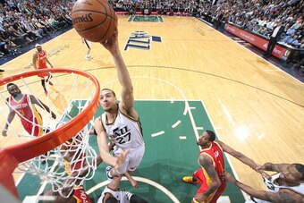 SALT LAKE CITY, UT - MARCH 12:  Rudy Gobert #27 of the Utah Jazz goes to the basket against the Houston Rockets on March 12, 2015 at EnergySolutions Arena in Salt Lake City, Utah. NOTE TO USER: User expressly acknowledges and agrees that, by downloading a
