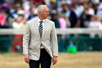 LOUISVILLE, KY - MAY 02:  Trainer Todd Pletcher walks on track prior to the 140th running of the Kentucky Oaks at Churchill Downs on May 2, 2014 in Louisville, Kentucky.  (Photo by Rob Carr/Getty Images)