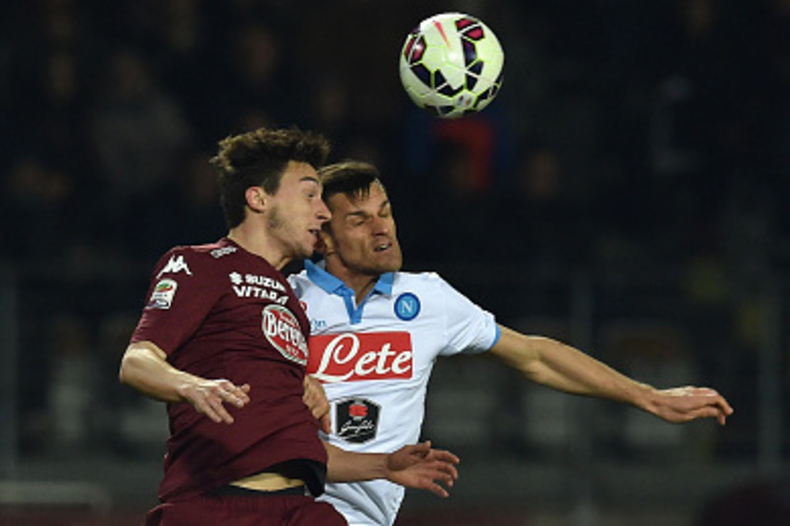 TURIN, ITALY - MARCH 01:  Matteo Darmian (L) of Torino FC goes up with Christian Maggio of SSC Napoli during the Serie A match between Torino FC and SSC Napoli at Stadio Olimpico di Torino on March 1, 2015 in Turin, Italy.  (Photo by Valerio Pennicino/Get