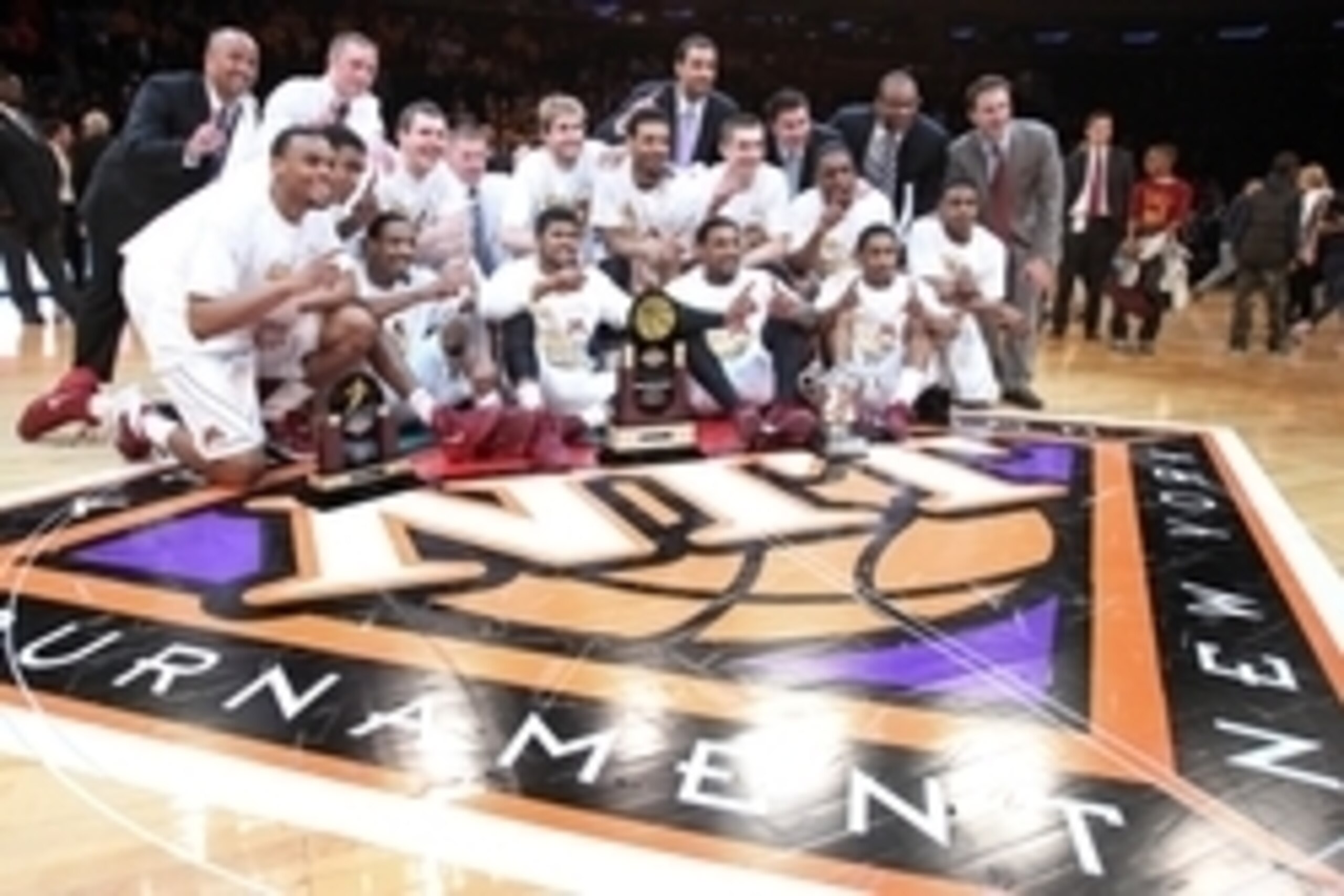 Apr 3, 2014; New York, NY, USA; The Minnesota Golden Gophers players celebrate after defeating the Southern Methodist Mustangs 65-63 in the 2014 NIT Tournament championship game at Madison Square Garden. Mandatory Credit: Adam Hunger-USA TODAY Sports