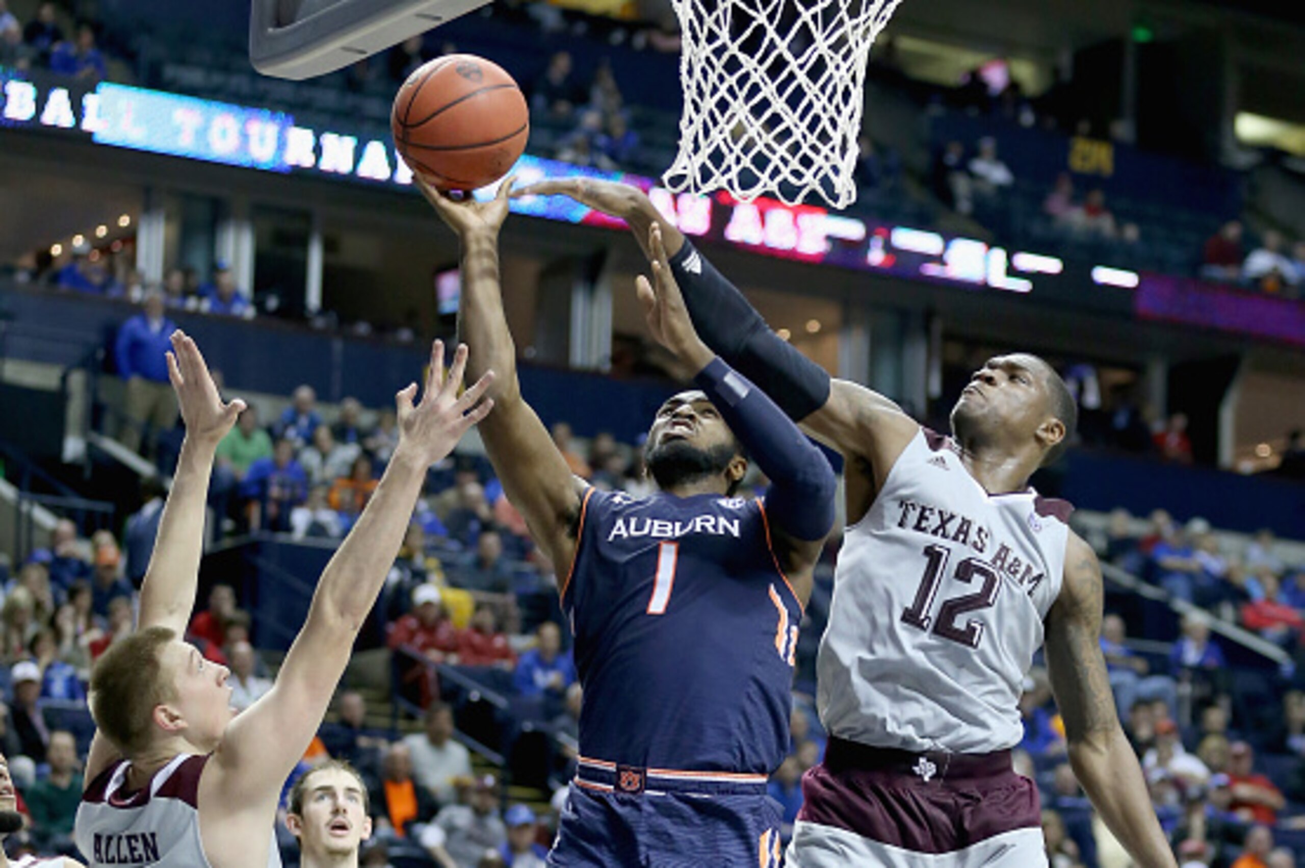 NASHVILLE, TN - MARCH 12:  KT Harrell #1 of the Auburn Tigers shoots the ball during the 66-59 win over the Texas A&M Aggies during the second round game of the SEC Basketball Tournament at Bridgestone Arena on March 12, 2015 in Nashville, Tennessee.  (Ph